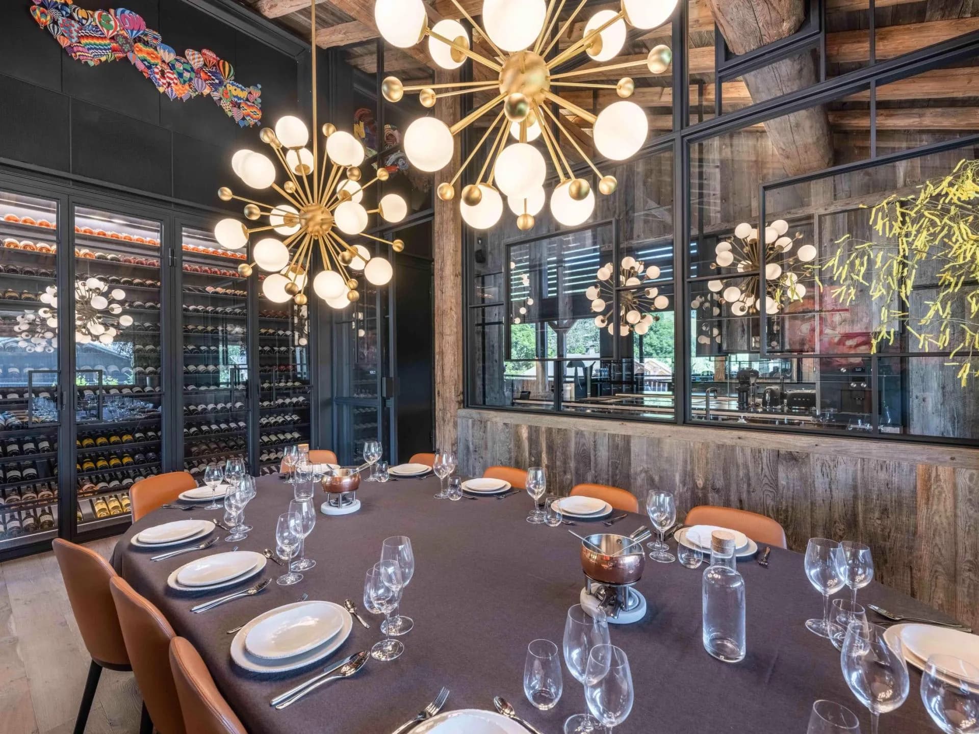 Dining room with wine storage and pendant lights
