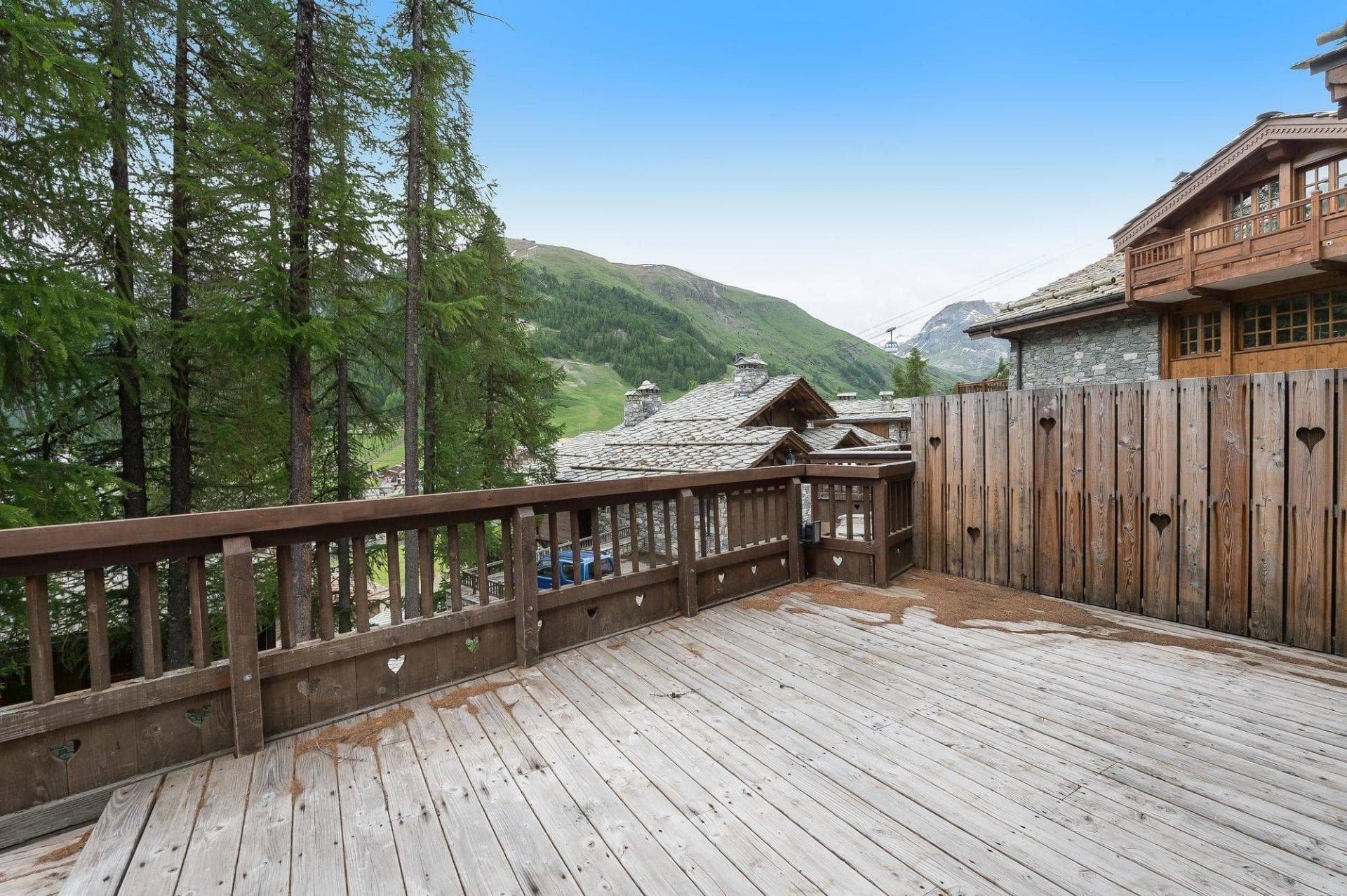 Private sun deck with mountain views and heart-cutout privacy fence