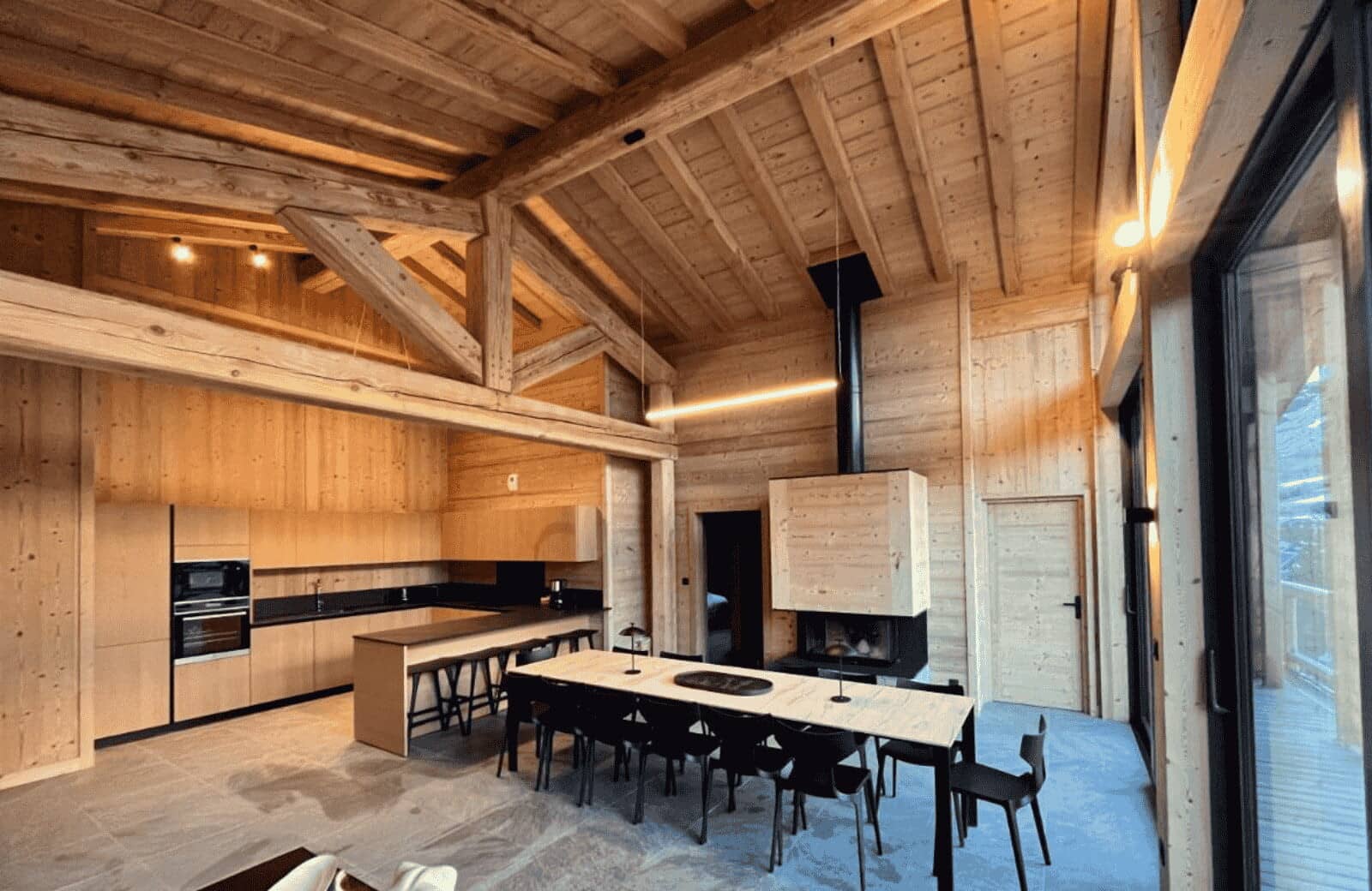 Kitchen and dining area with fireplace and seating for 10