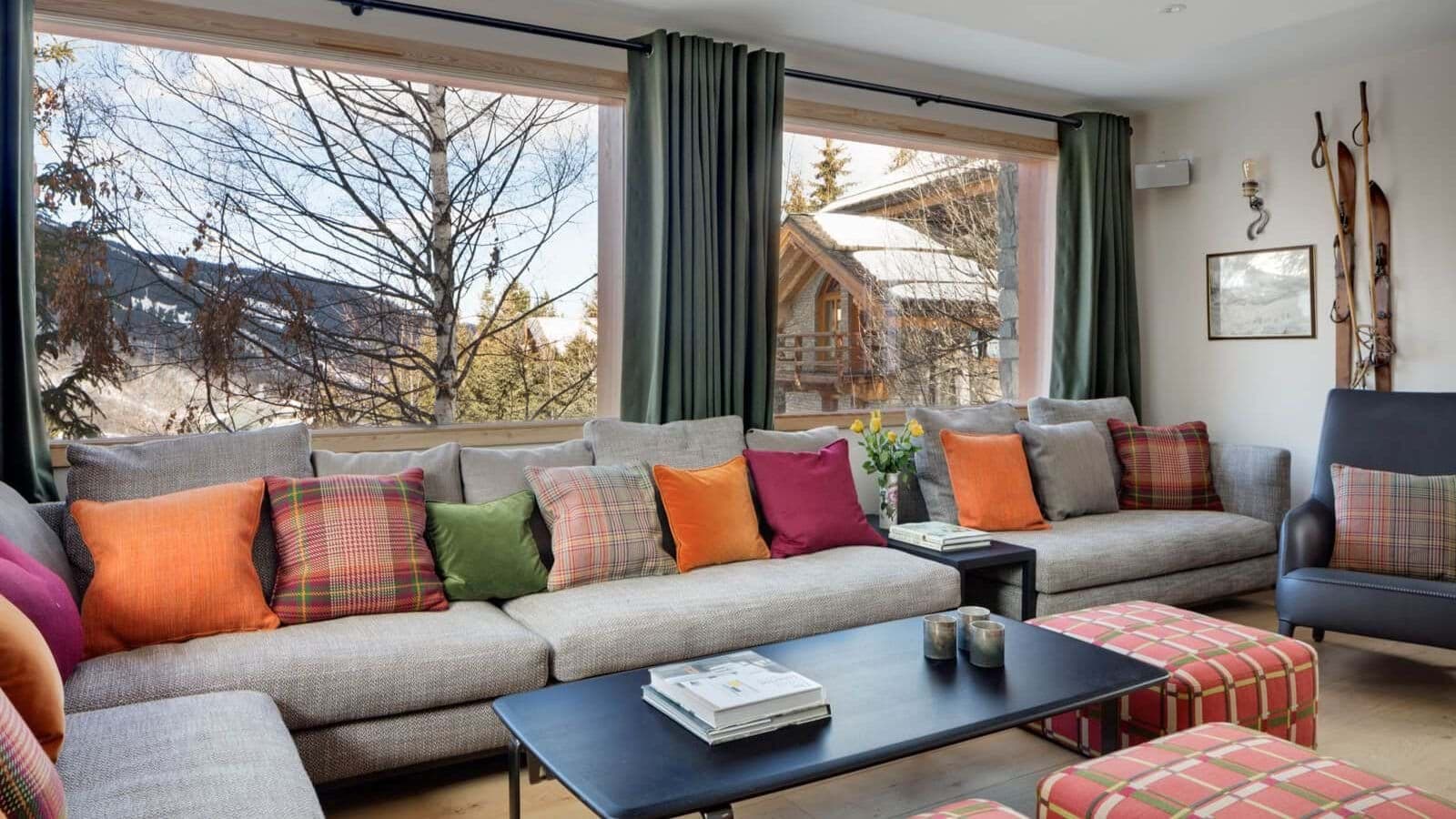 Living area with sectional seating for 10 and mountain views