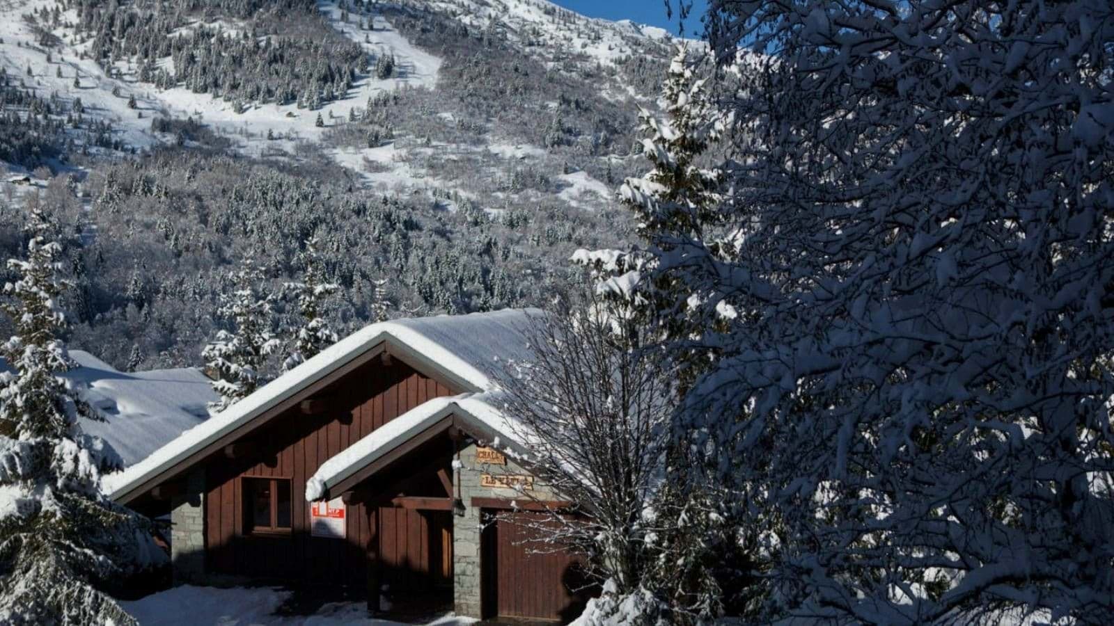 Chalet exterior with timber siding and ski-in/ski-out mountain access