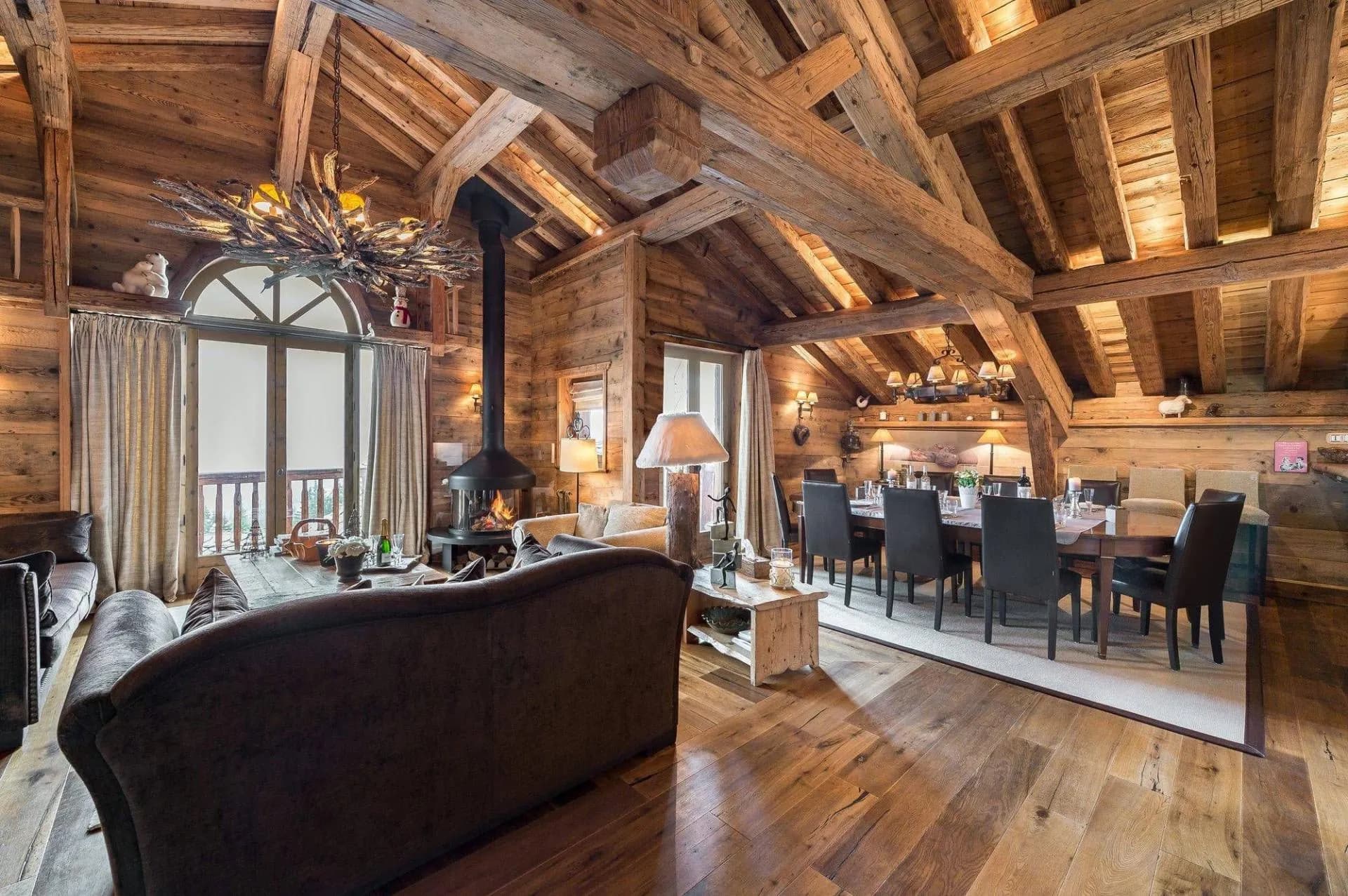 Living and dining room beneath timber beams