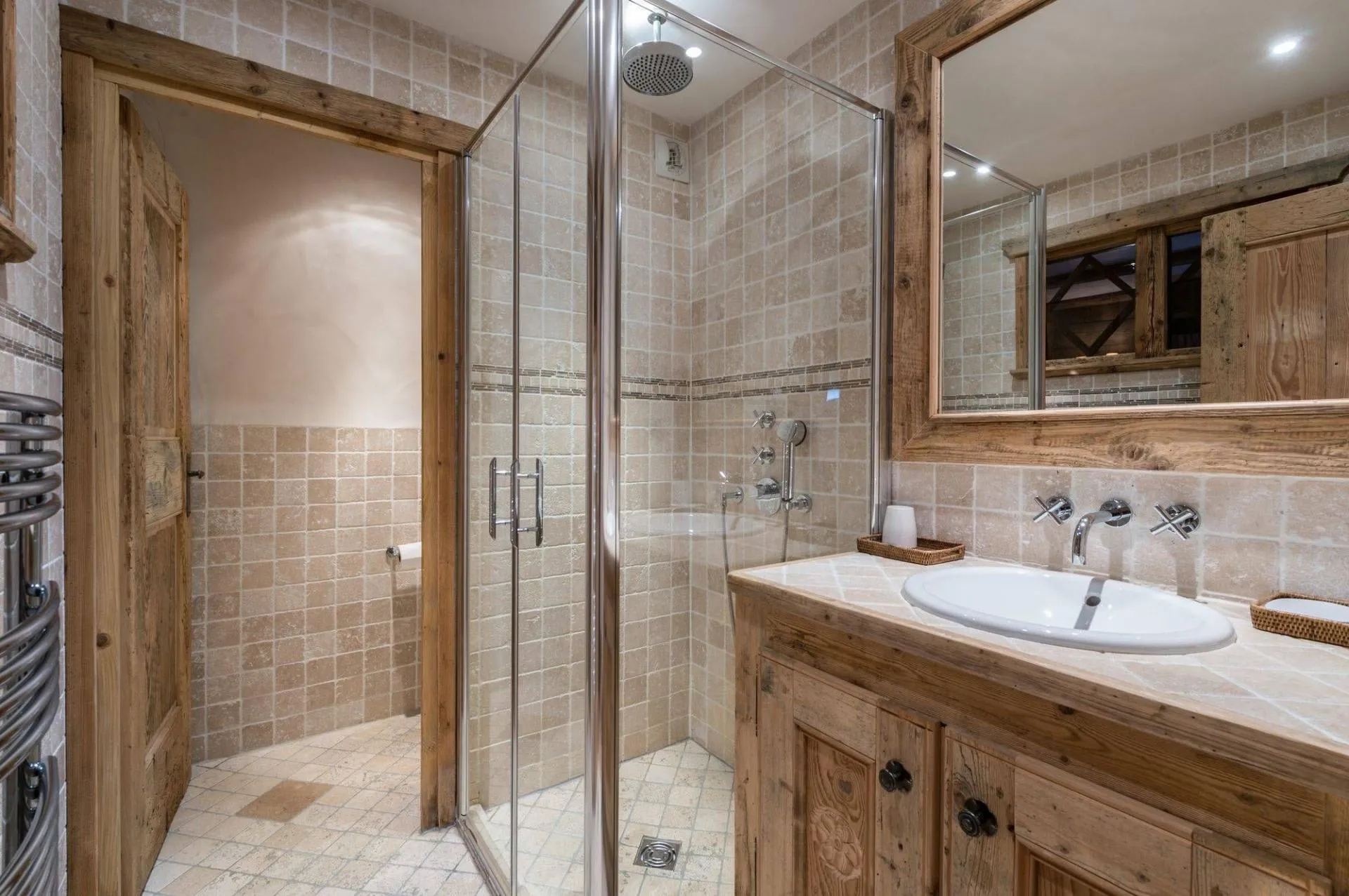 Shower room with glass enclosure and double basins