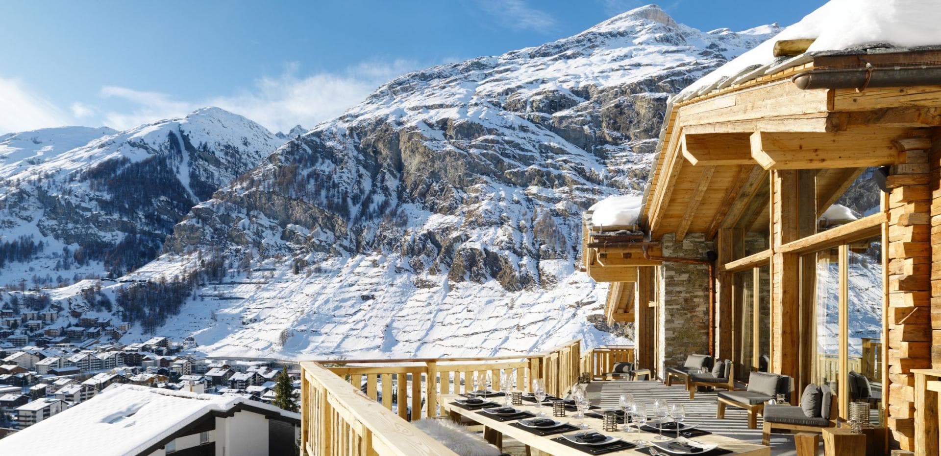 Private deck with dining for 10 and Zermatt village views