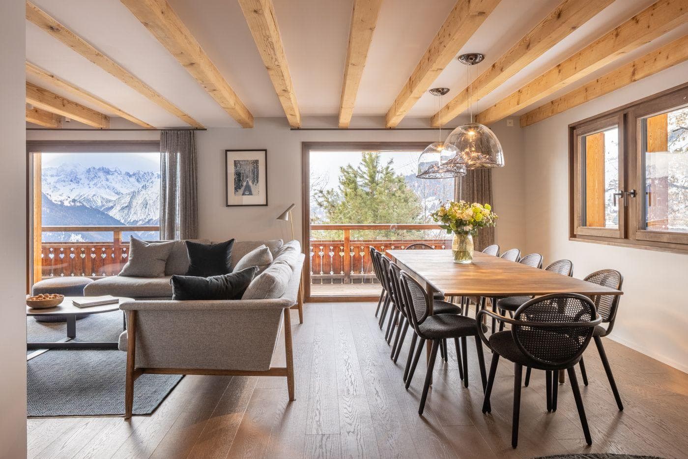 Open-plan living and dining; seats 8; alpine lake and mountain views