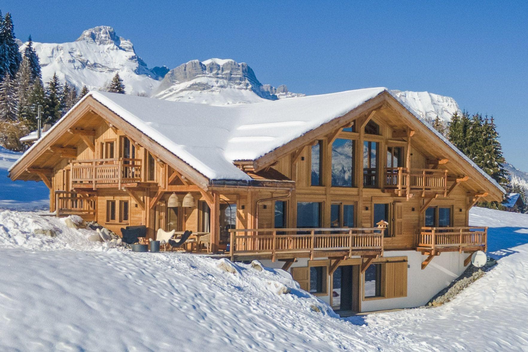 Ski-in/ski-out timber chalet with wrap-around balconies and mountain views