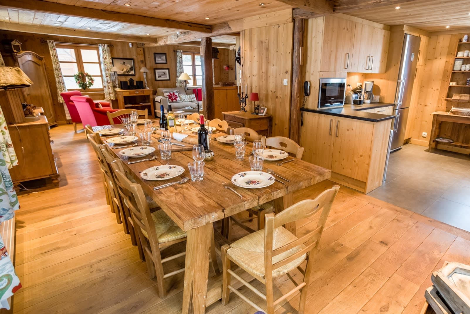 Open-plan dining area with seating for 10 adjacent to the kitchen