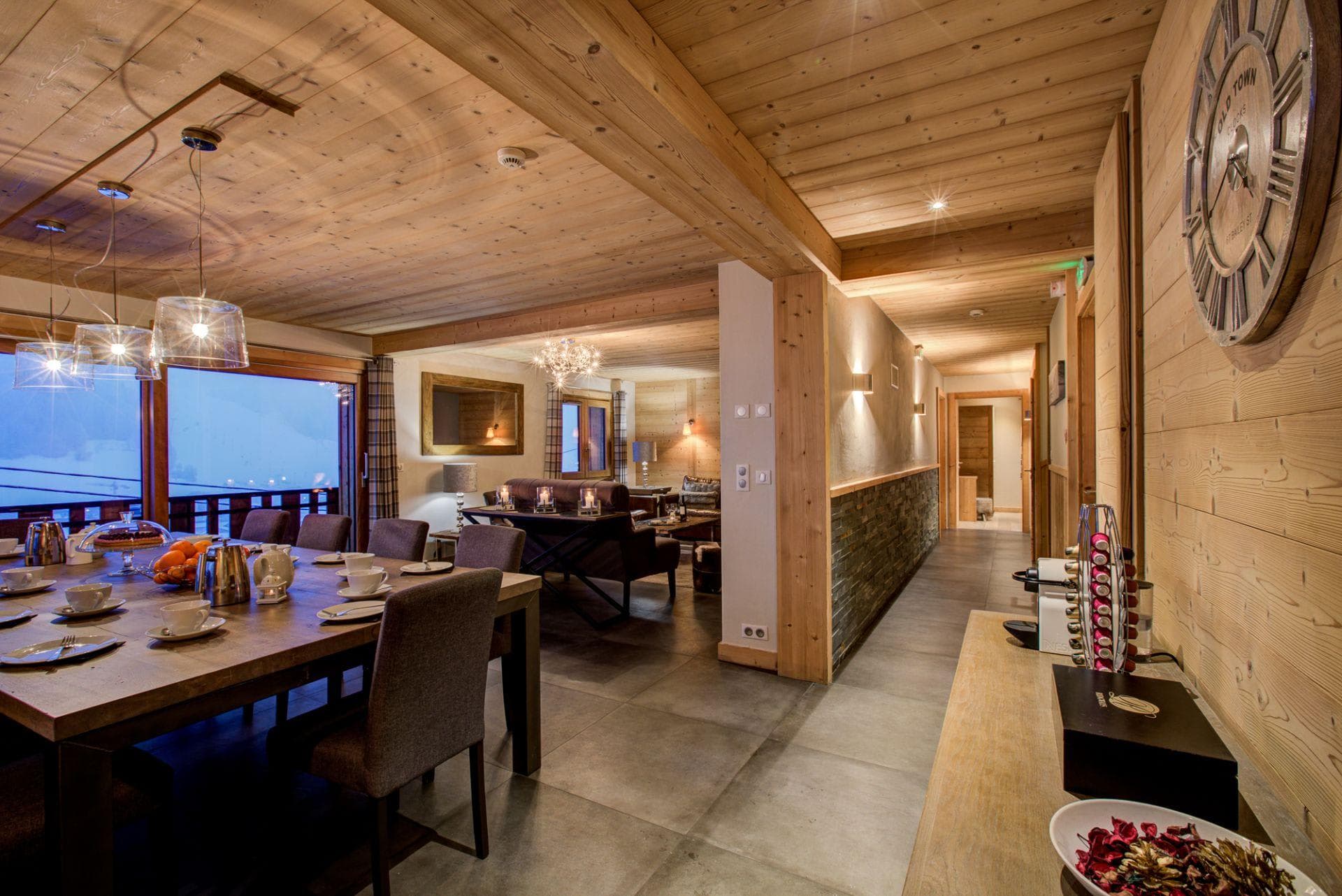 Dining area seating 10 with mountain views and balcony access
