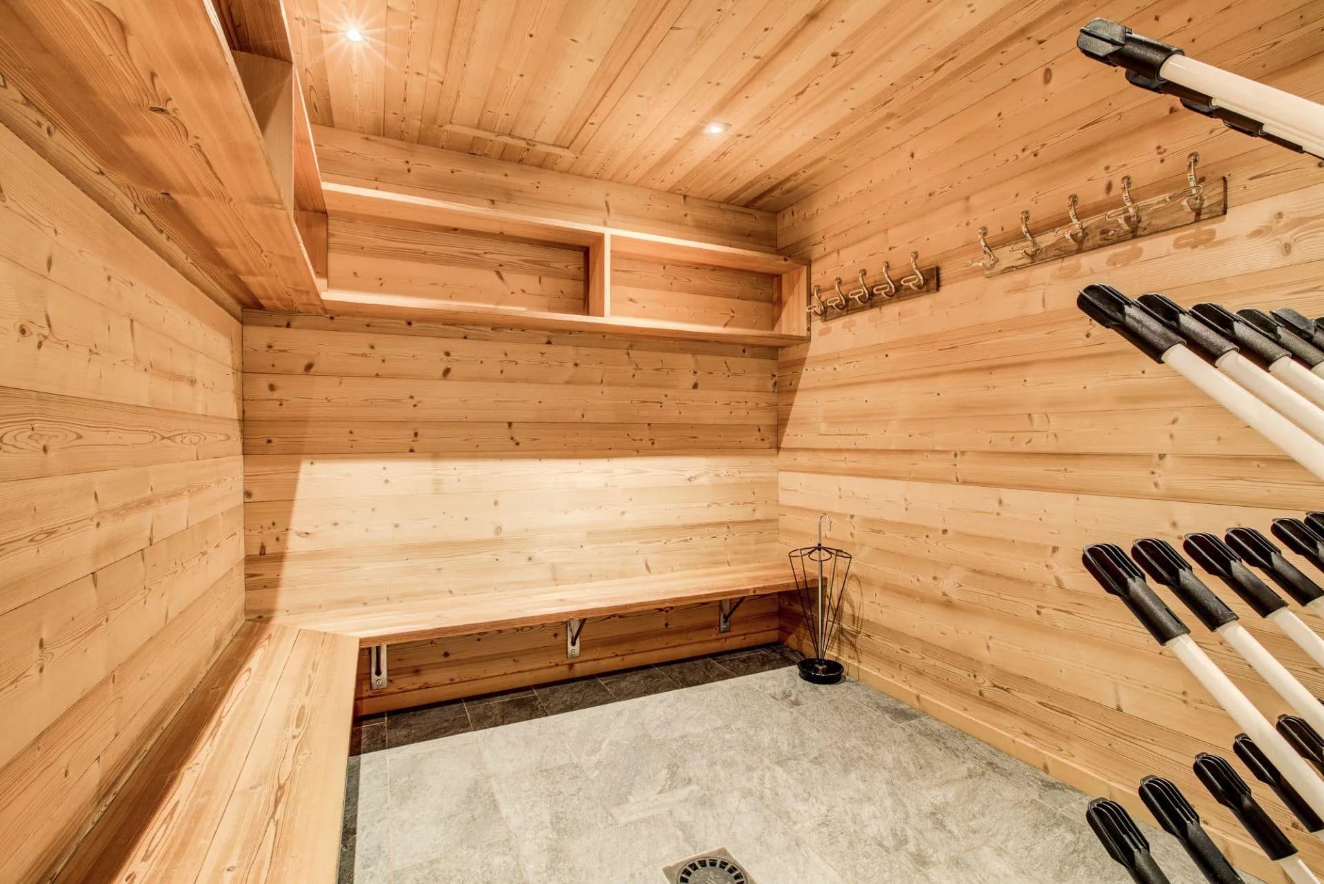 Boot room with heated boot racks