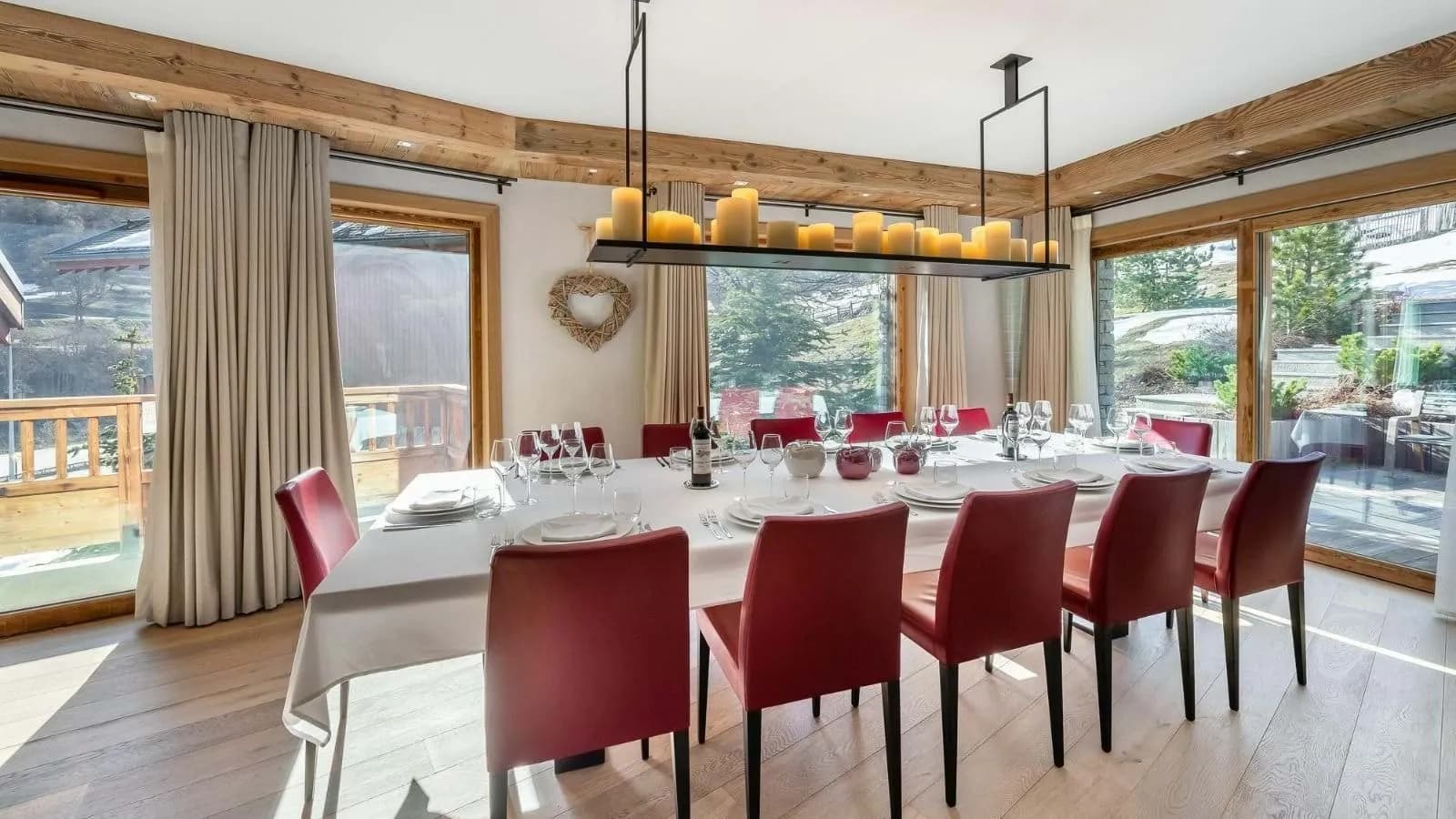 Dining area for 12 with terrace access and mountain views