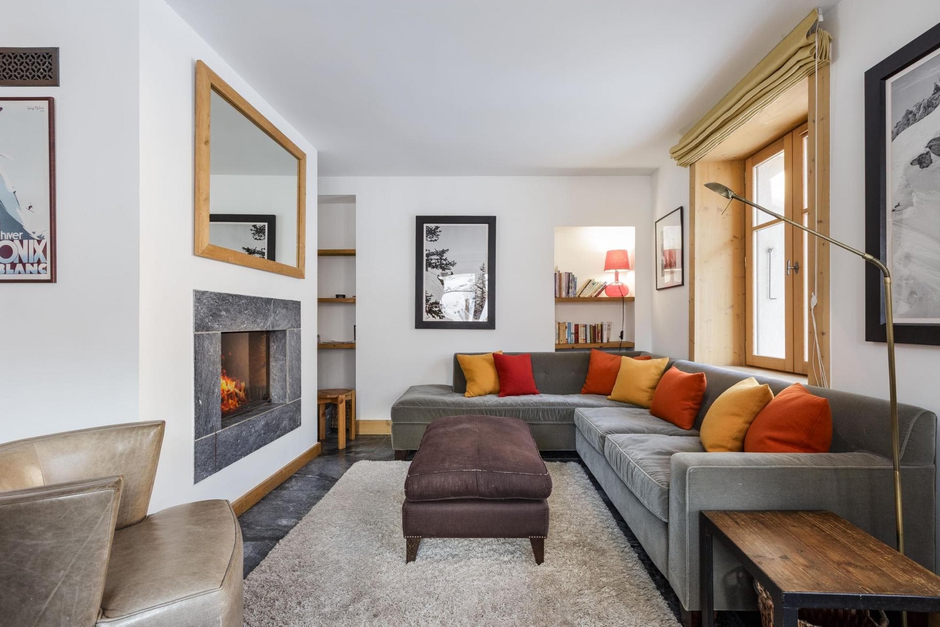 Living area with wood-burning fireplace and sectional seating for 6