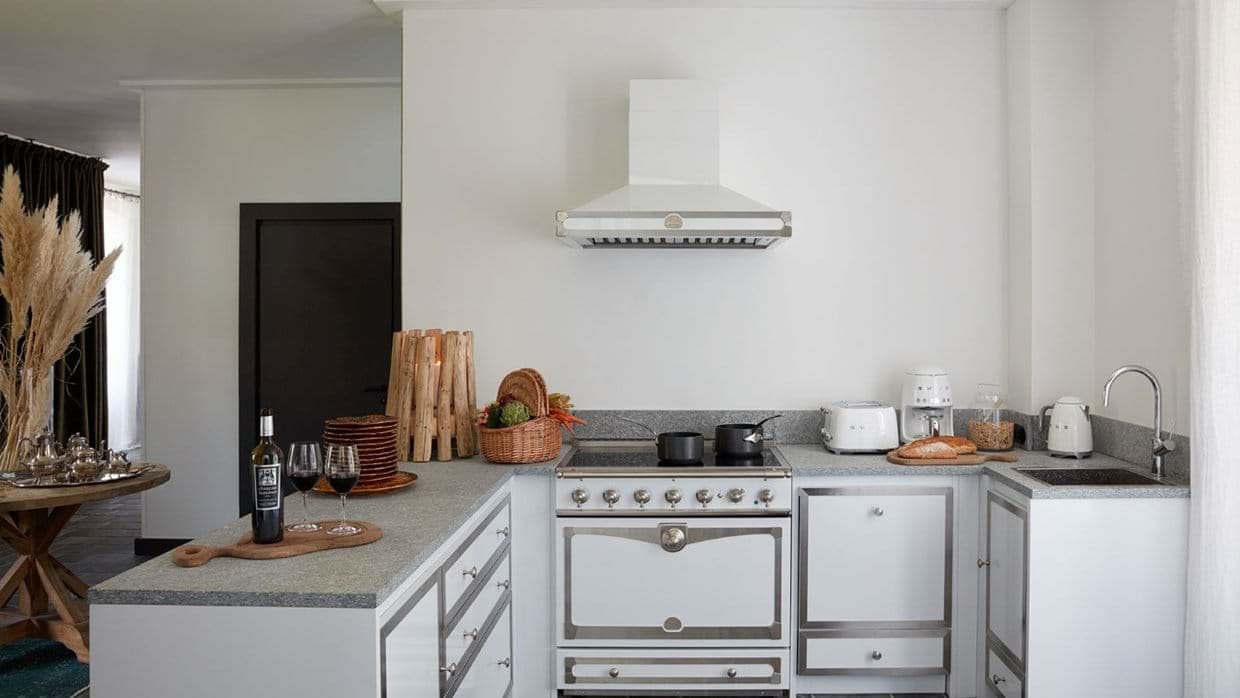 Kitchen with professional-style range and Smeg appliances