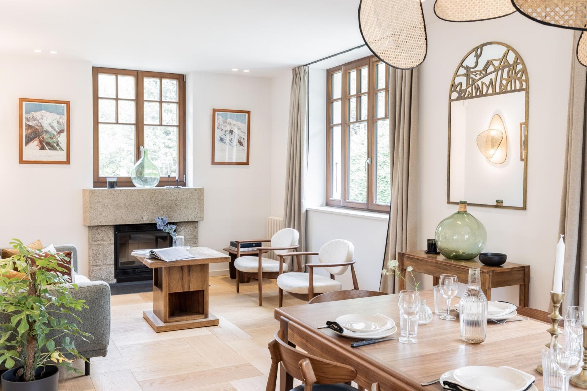 Living and dining area with stone fireplace and seating for 6