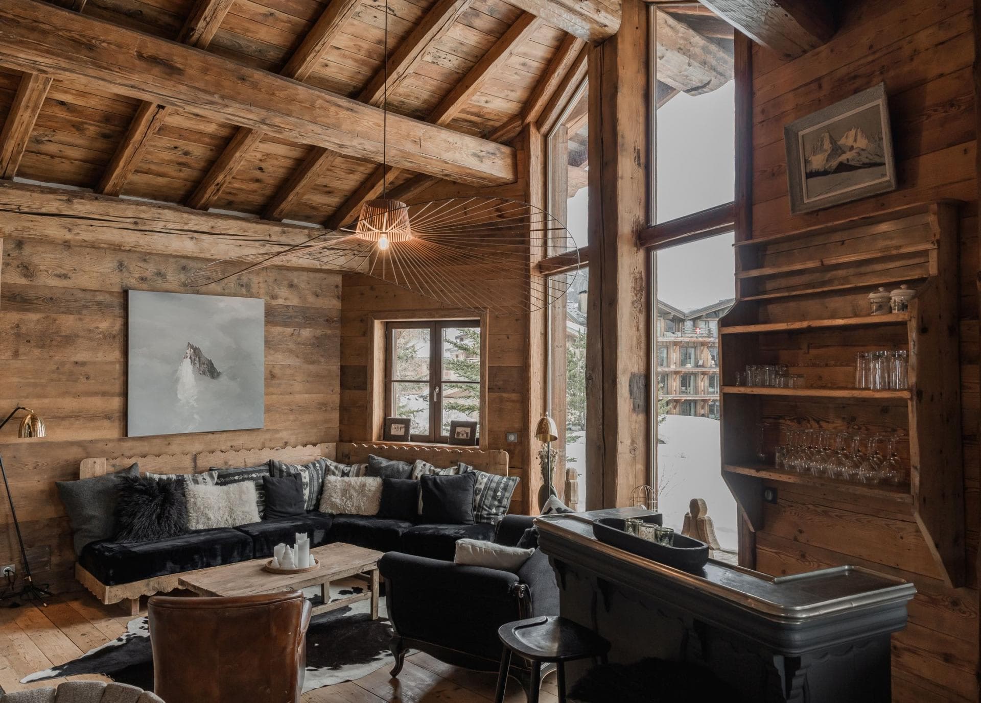 Living area with sectional seating and built-in wet bar