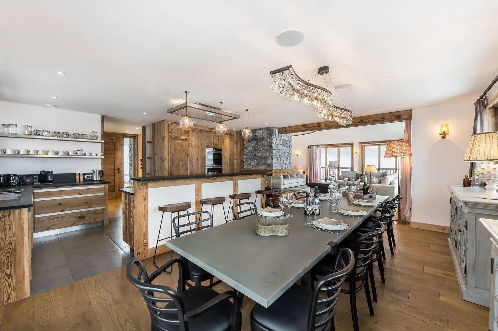 Dining area with seating for ten beside the open kitchen