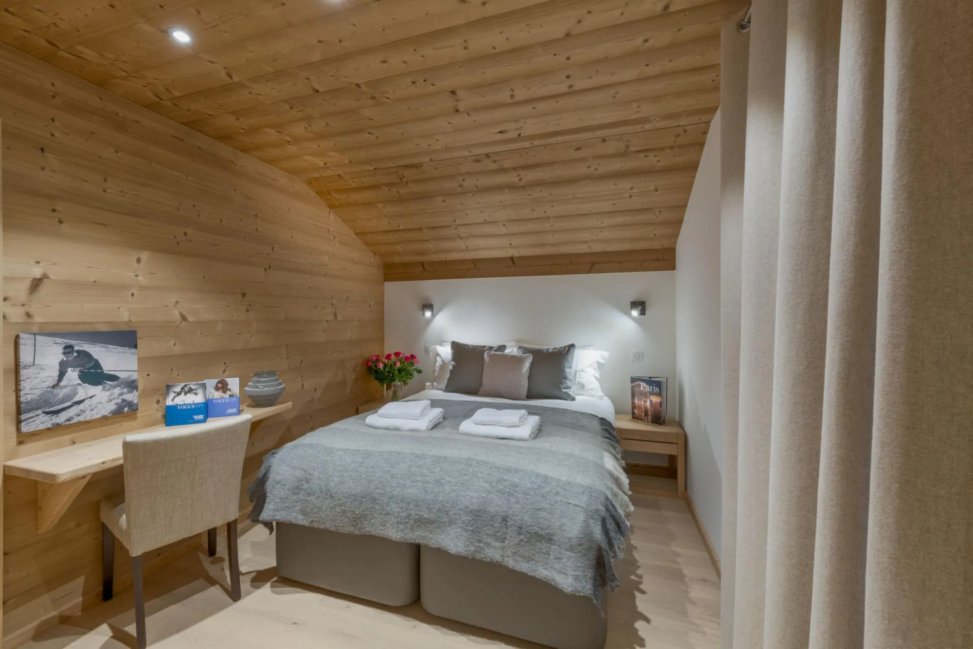 Guest bedroom with a king bed and built-in desk