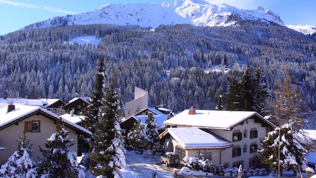 Ski resort village views with immediate mountain and forest access