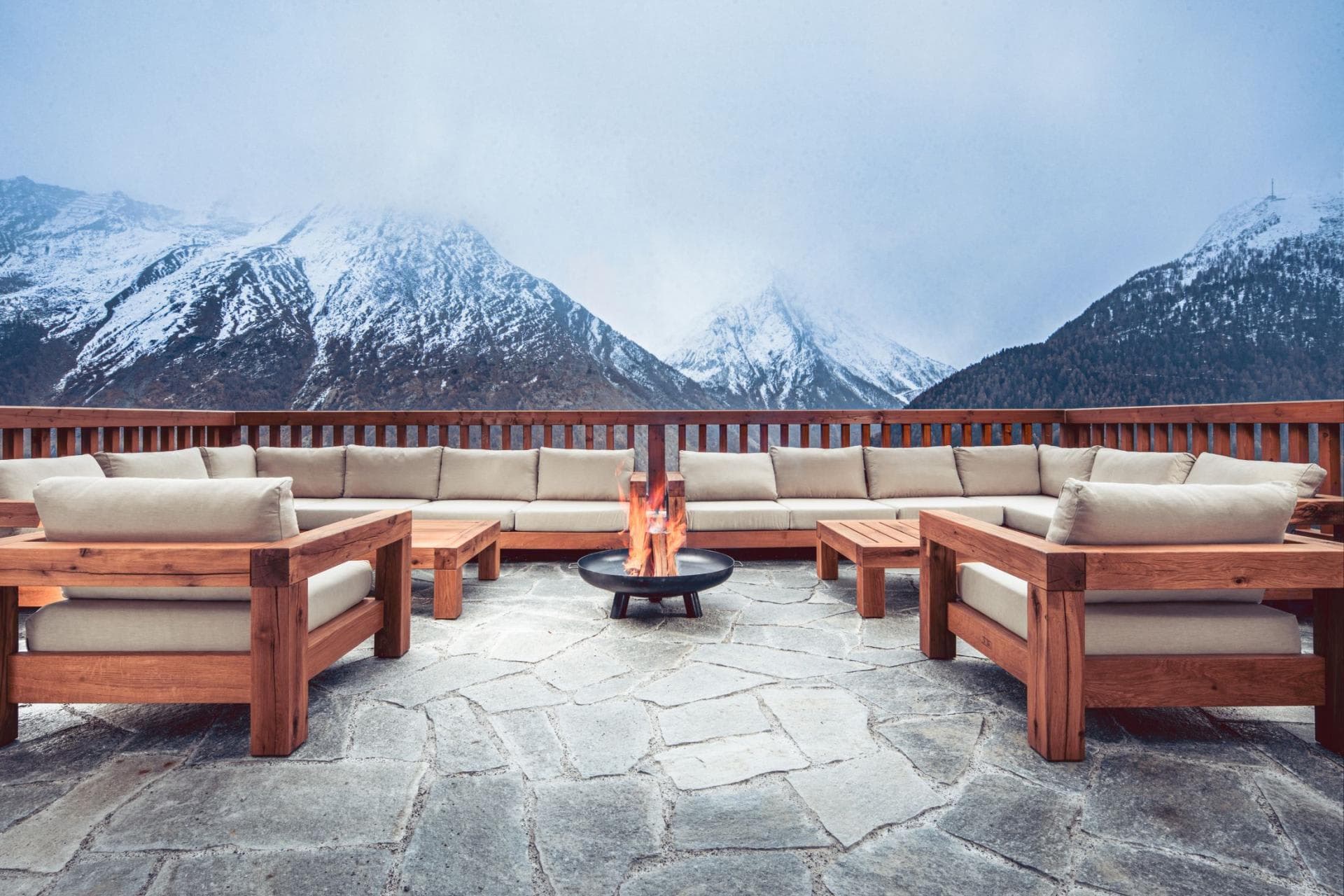 Stone patio with wood-burning fire pit seats 12; mountain views
