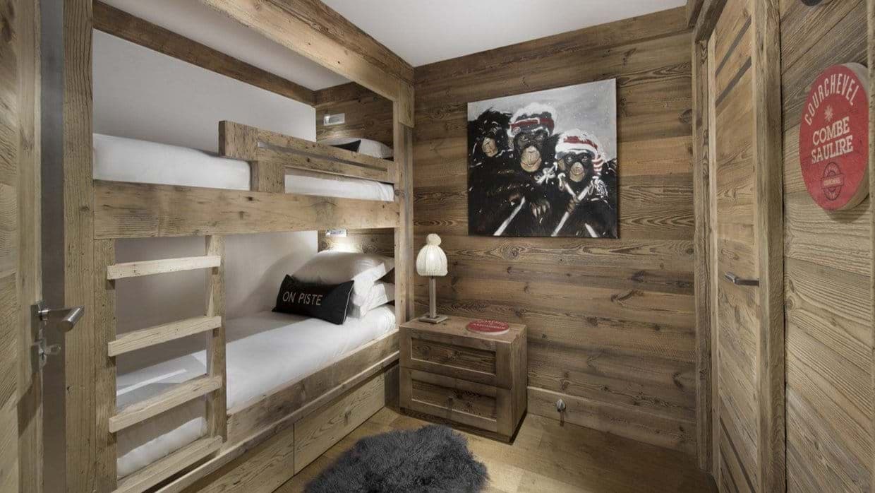Bunk room with twin-over-twin beds and individual reading lights