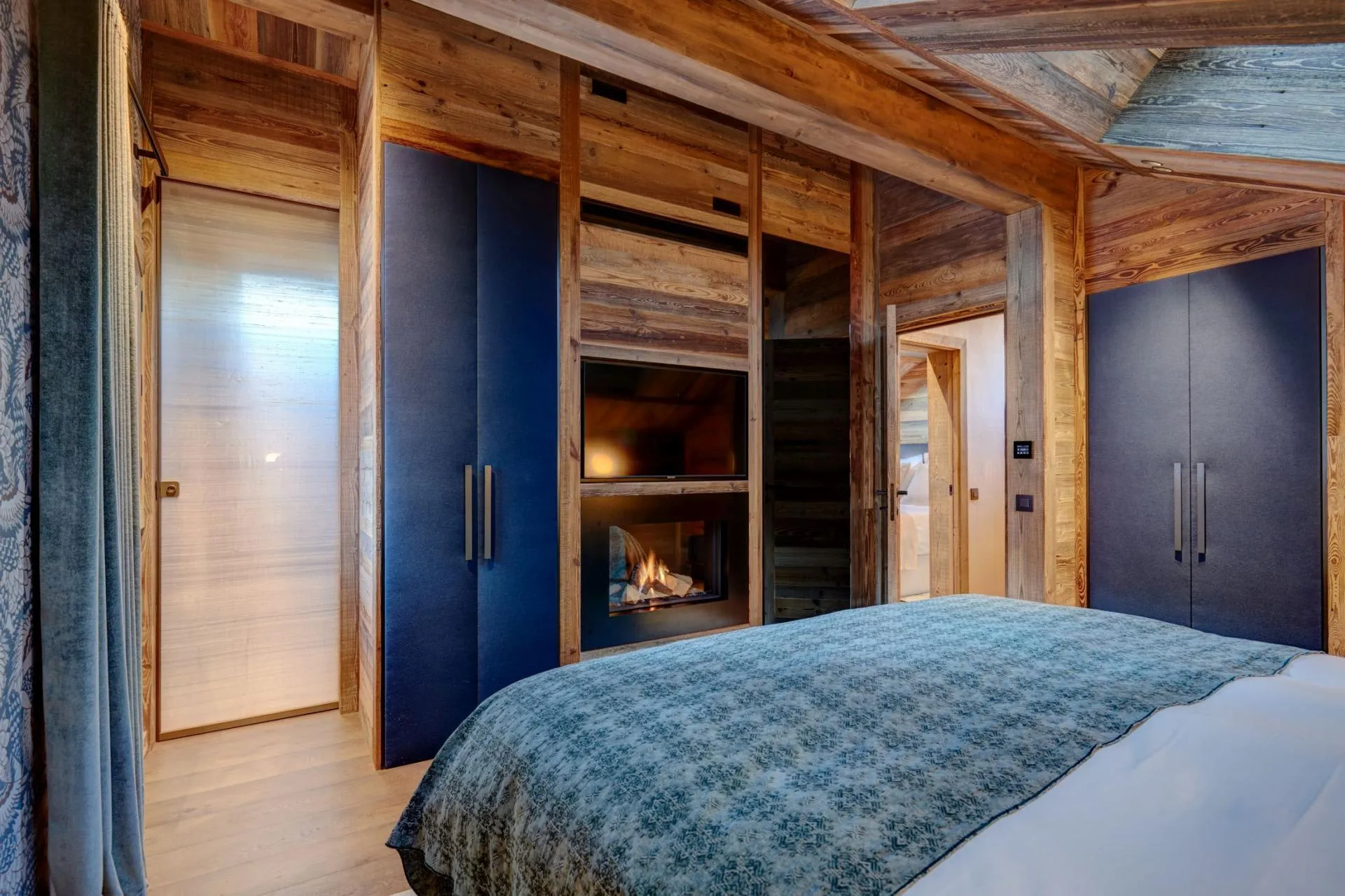 Double bedroom with timber doors