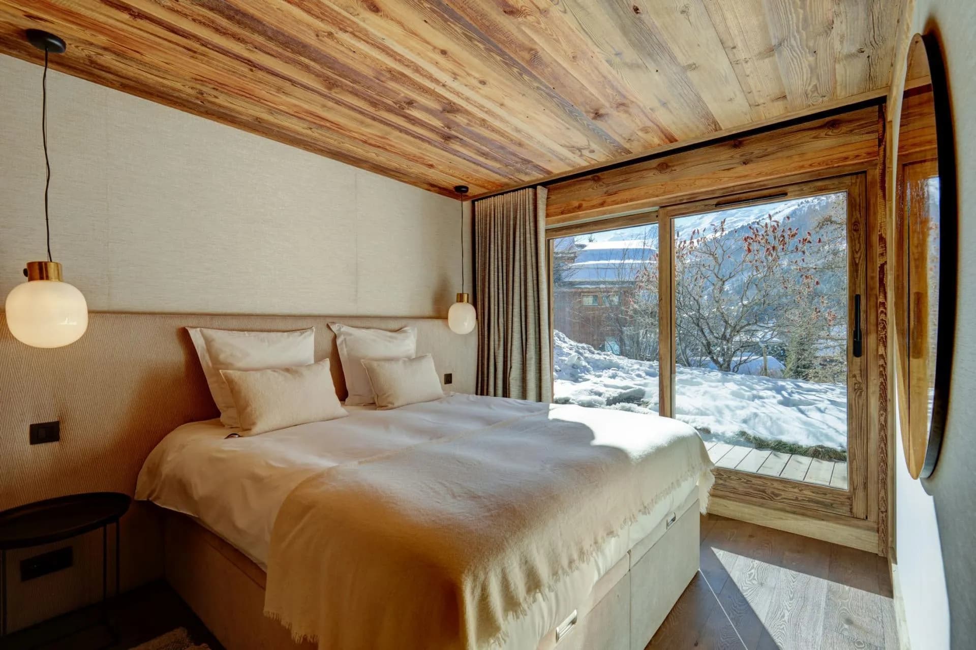 Double bedroom beside glazed terrace doors