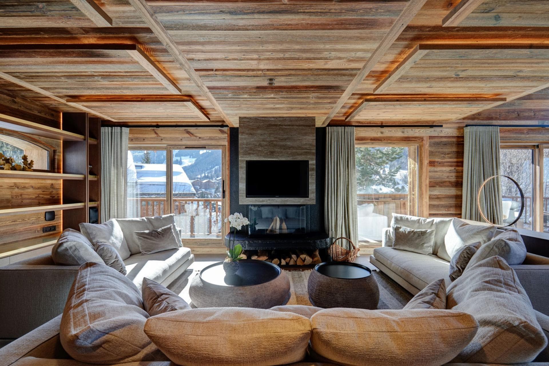 Living room with fireplace and seating for 8; mountain views