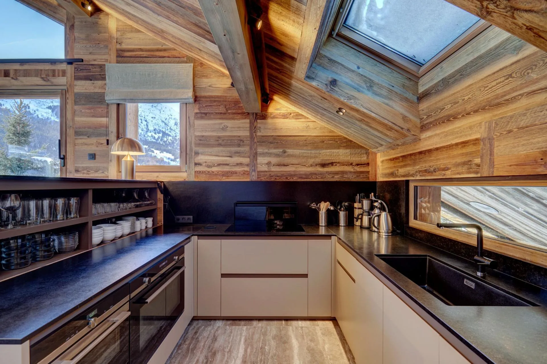 Kitchen beneath a skylight