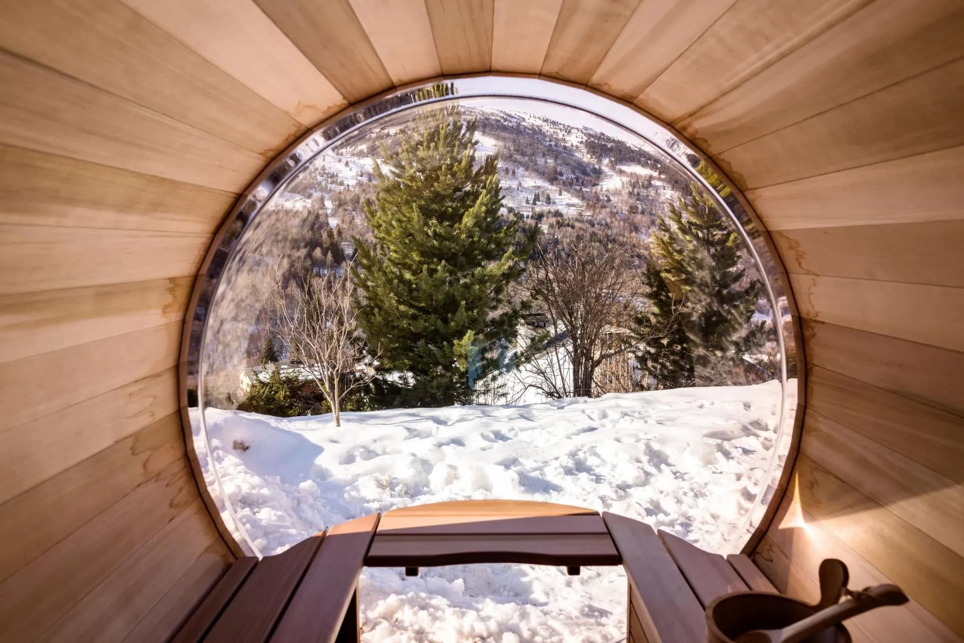 Outdoor sauna interior with a round window