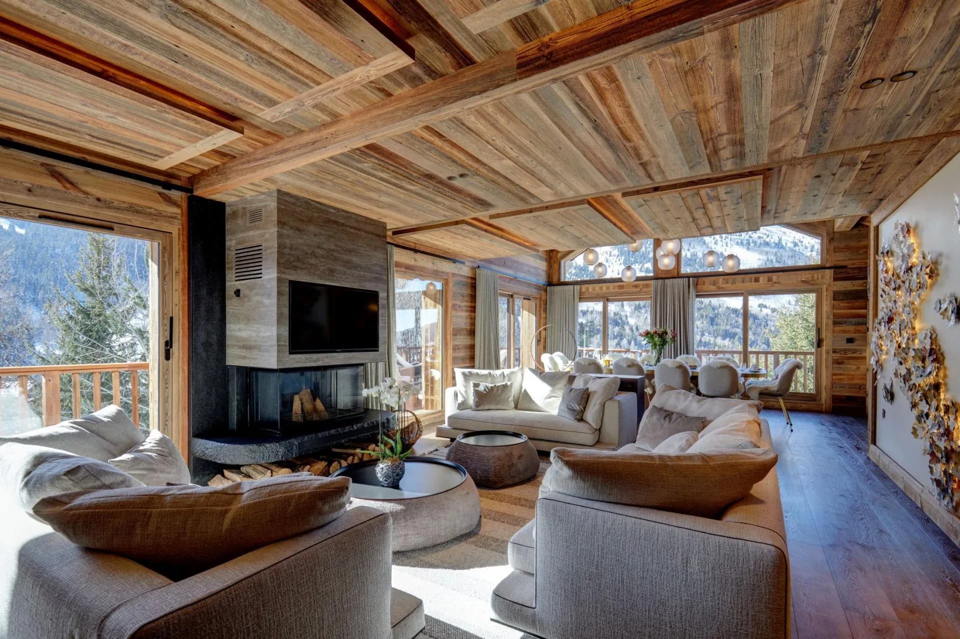 Living room with fireplace and timber beams