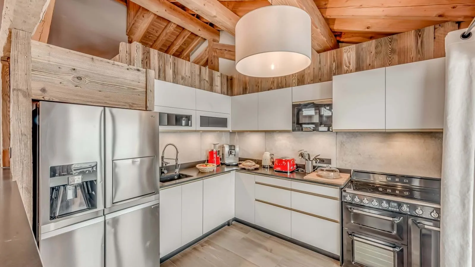 Kitchen with Smeg double oven and large French door refrigerator