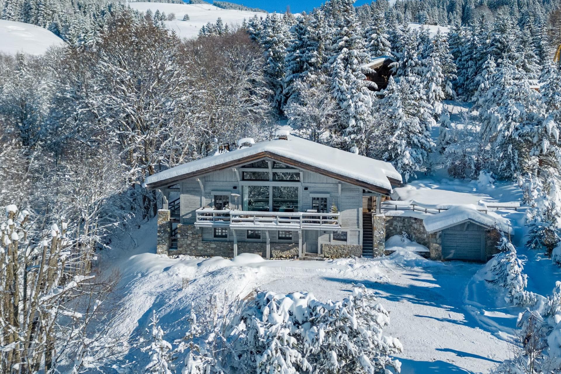 Ski-in/ski-out chalet with private garage and wrap-around balcony