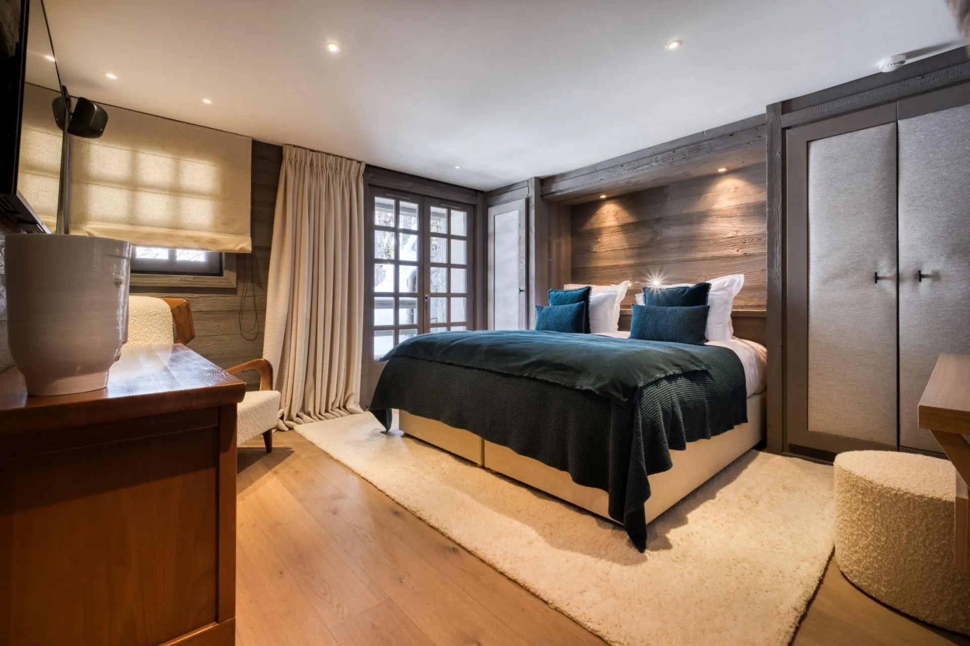 Guest bedroom with queen bed and direct terrace access