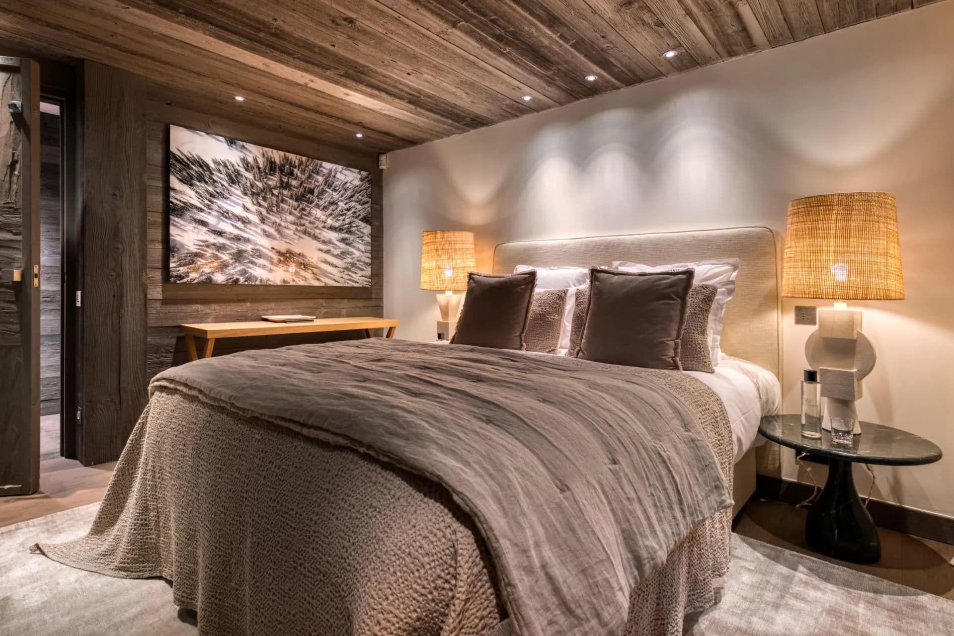 Guest bedroom with king bed and reclaimed wood ceiling