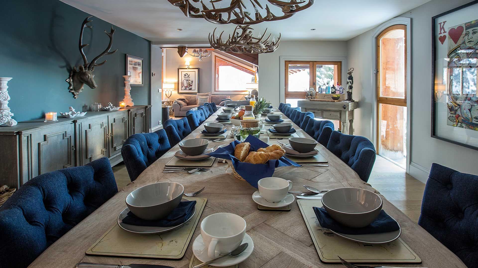 Dining table with seating for 16 and parquet wood top