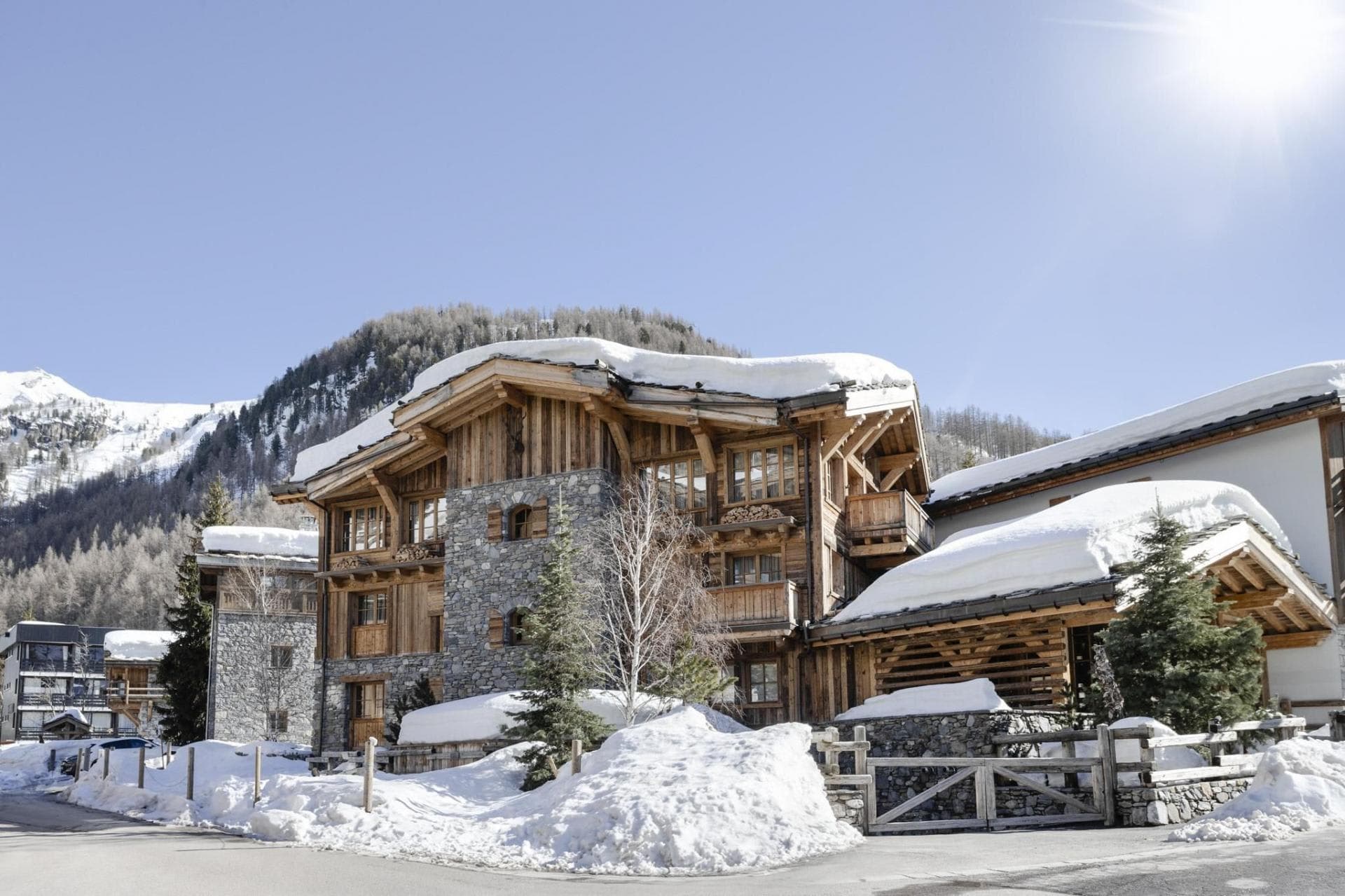 Ski-in chalet with stone facade and private gated entrance