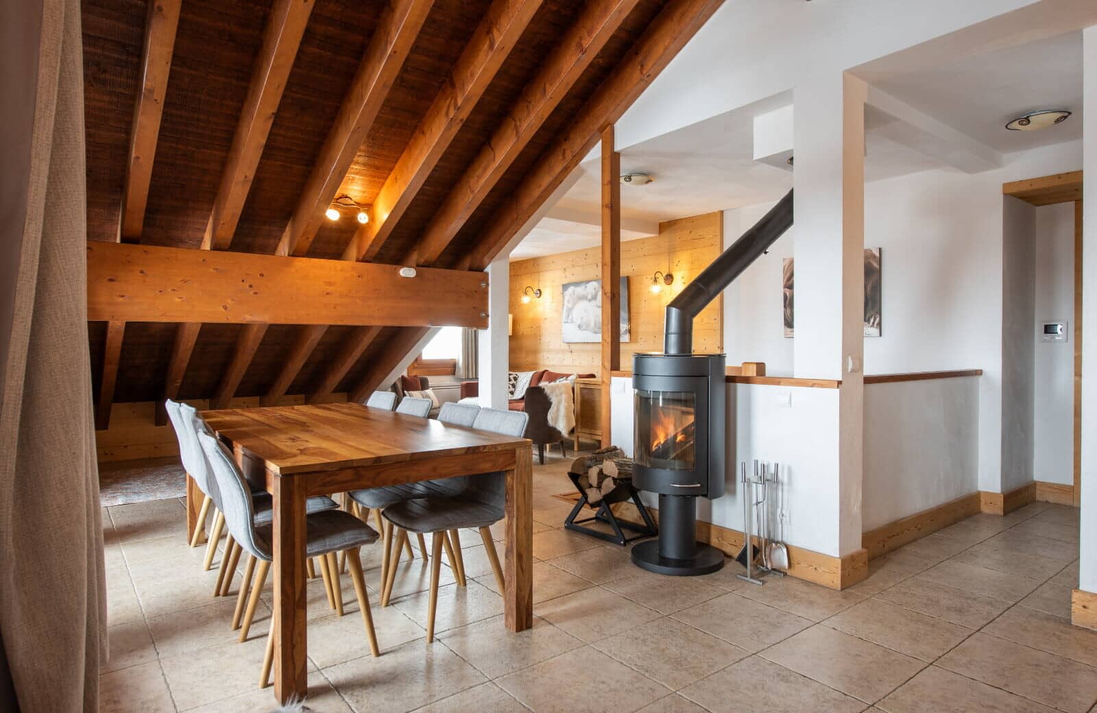 Dining area with seating for 6 and wood-burning stove