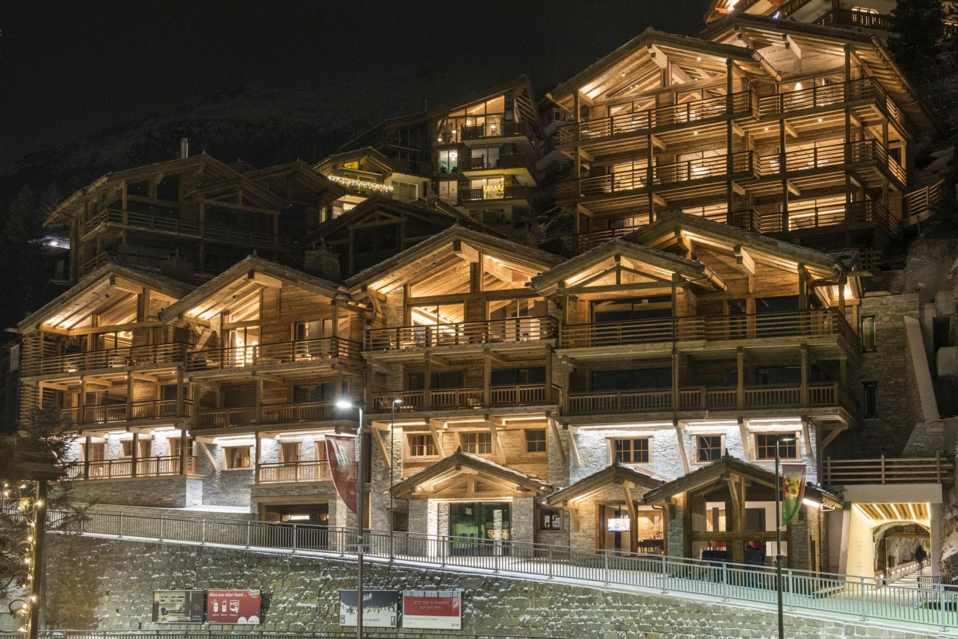 Ski-in/ski-out chalet exterior with private balconies and mountain views