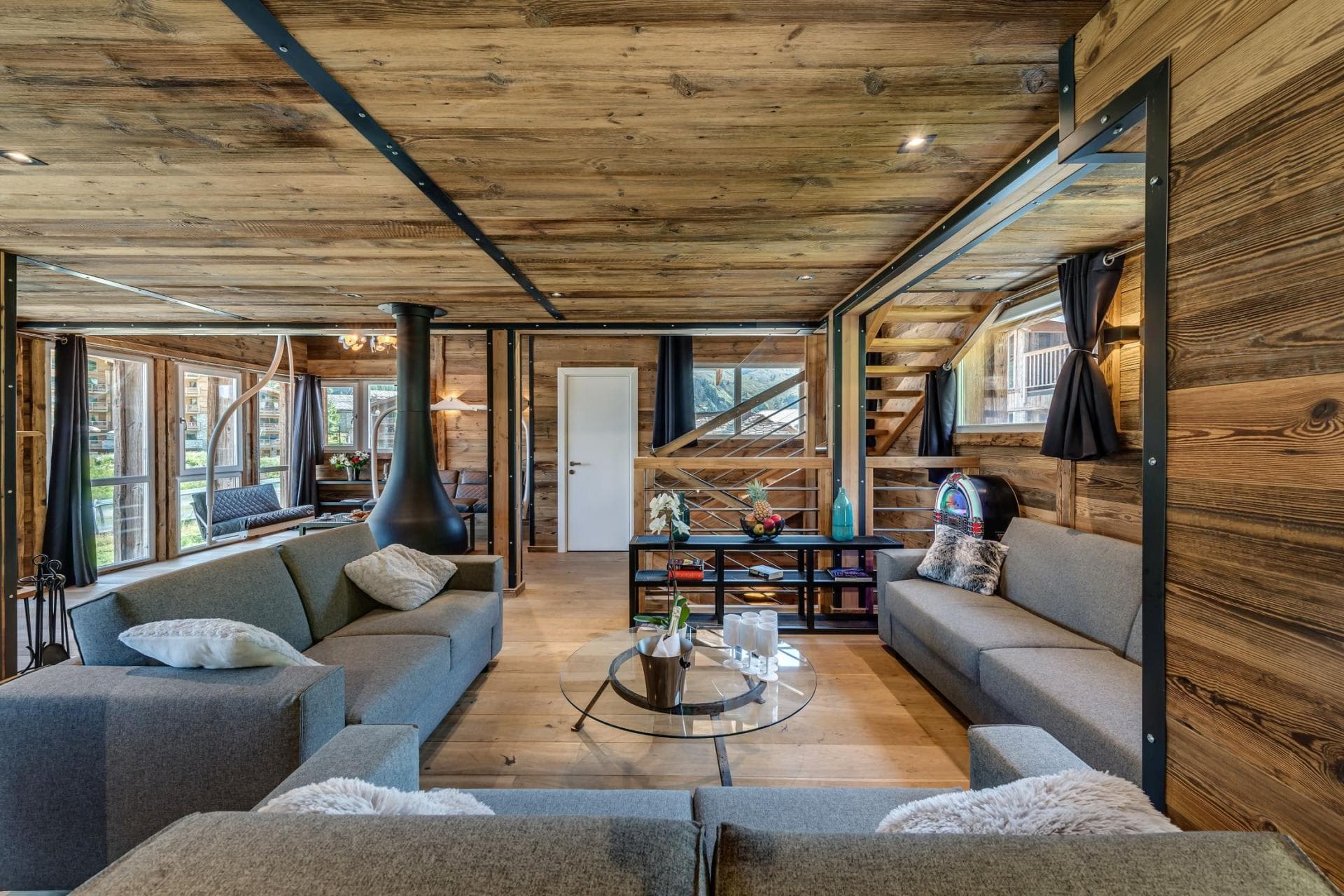 Living area with wood-burning fireplace and seating for 10