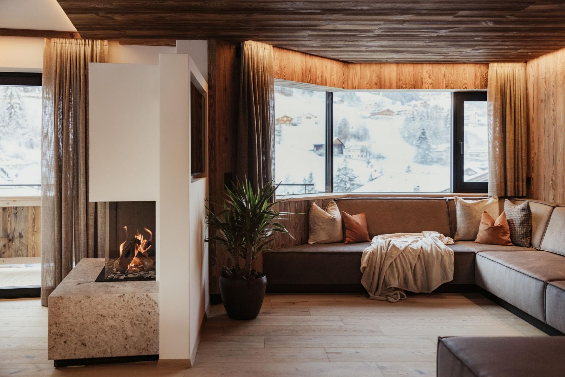 Living area with gas fireplace and mountain-view window seat