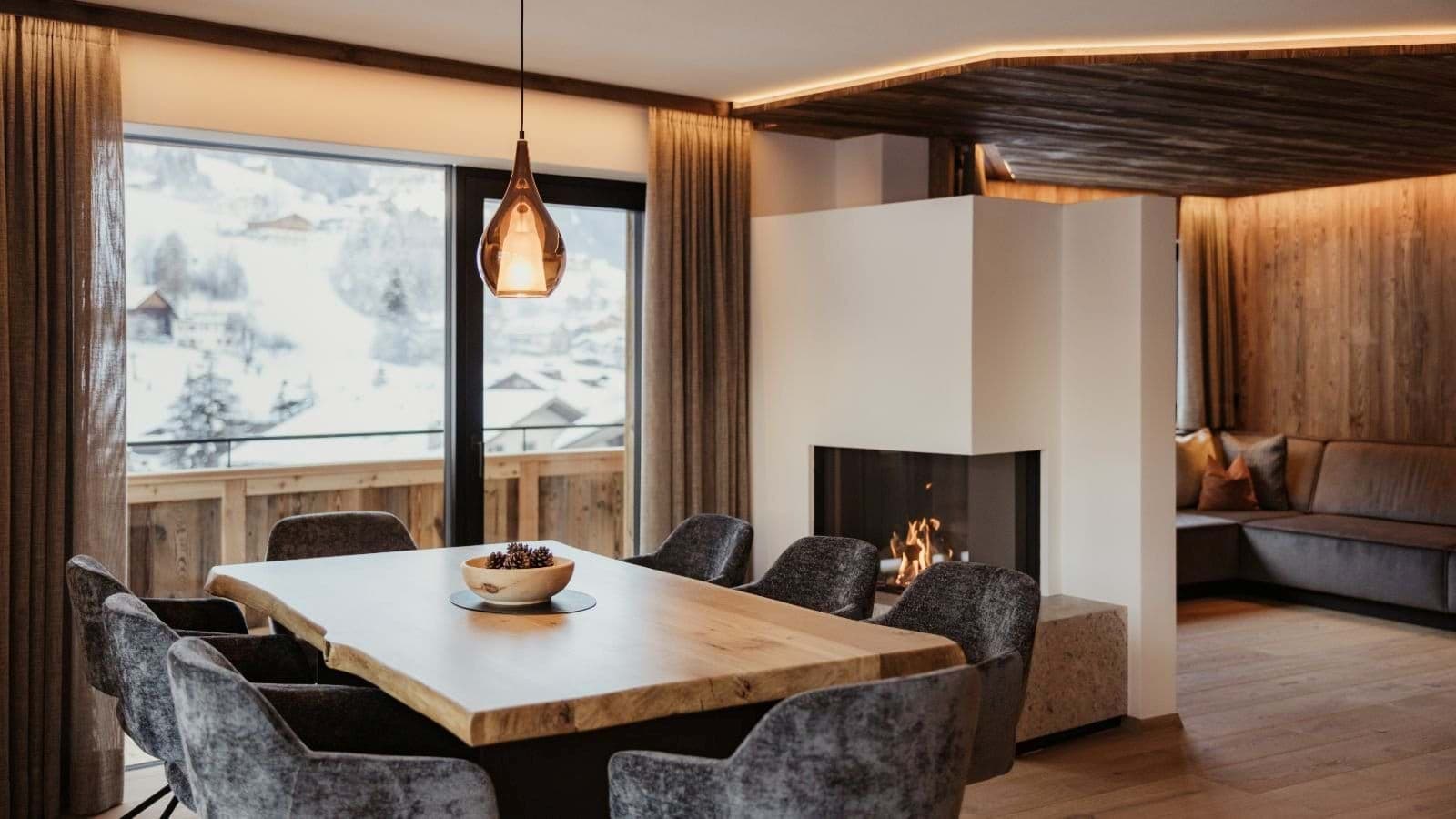 Dining area seats 6; connects to fireplace lounge with alpine views