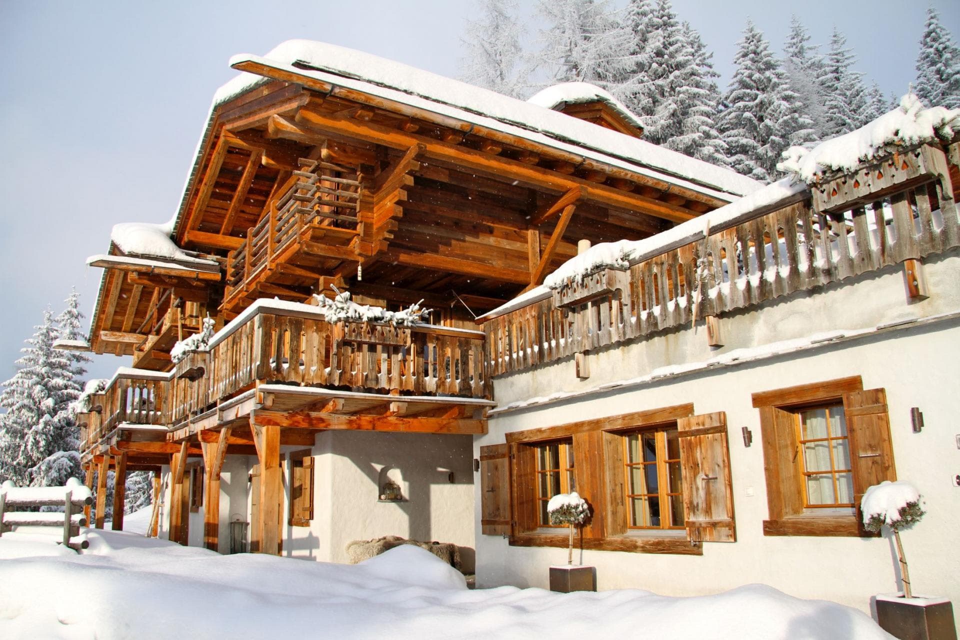 Chalet exterior featuring wrap-around balconies and traditional timber construction