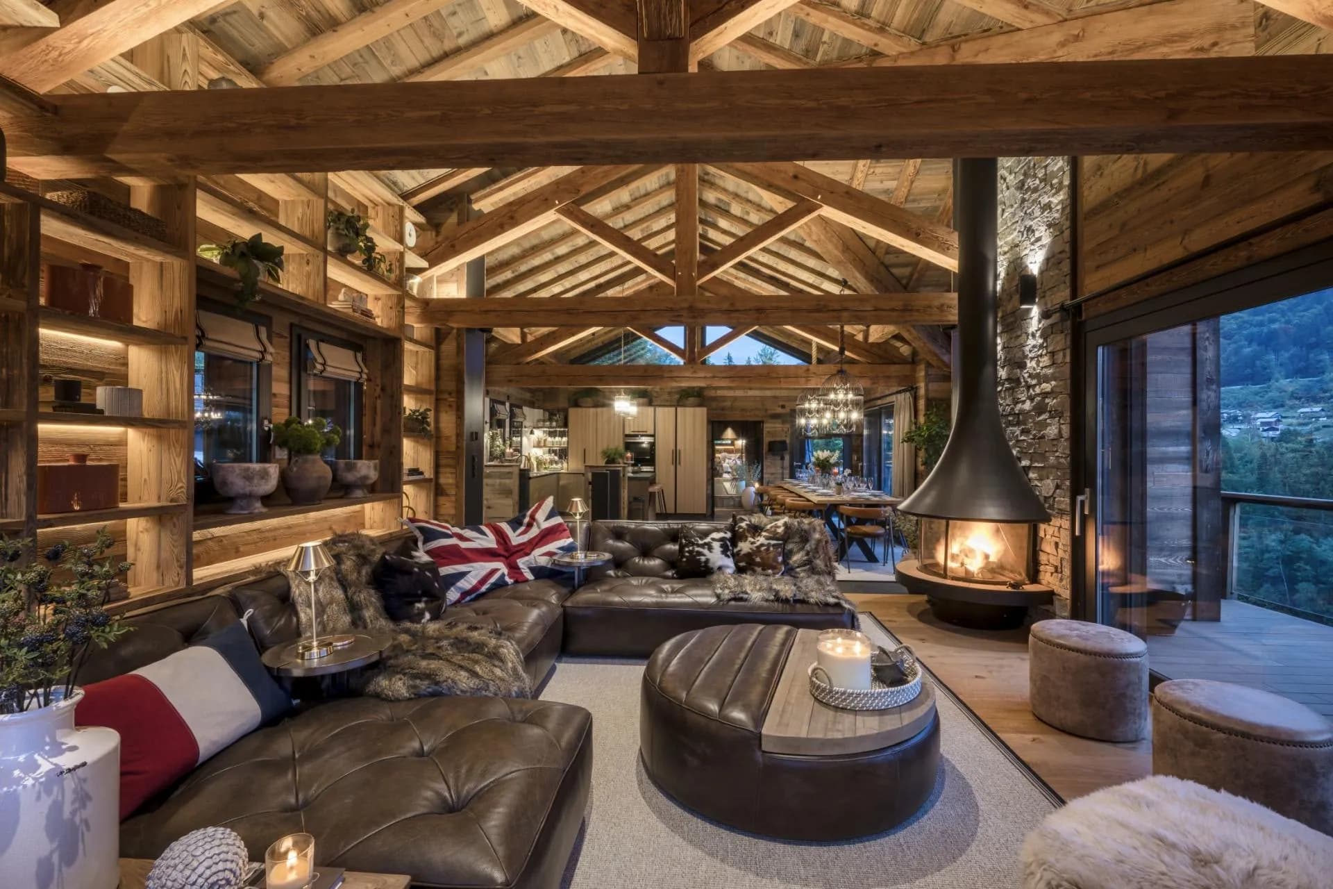Living area with leather seating and a wood-burning stove