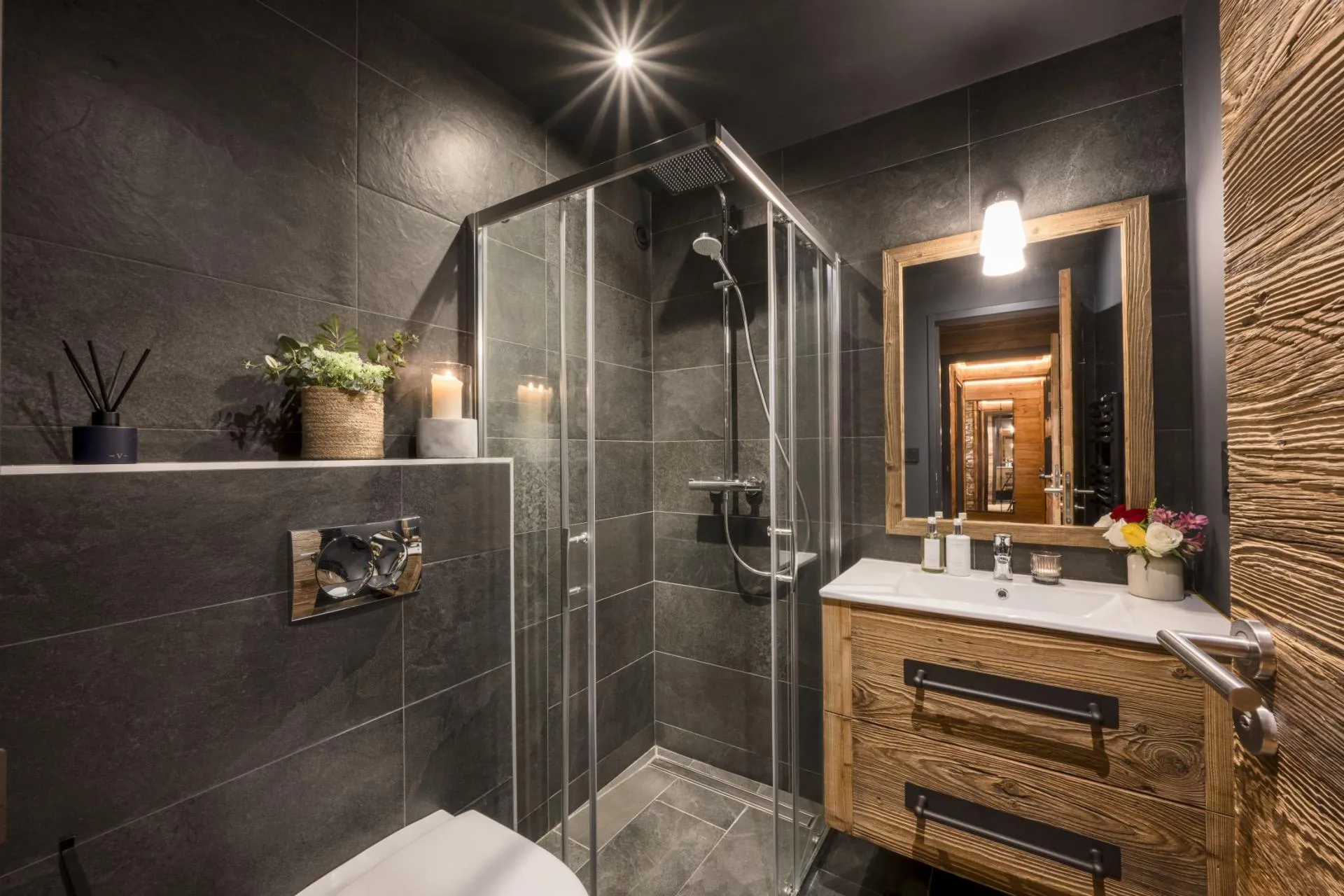 Bathroom with a walk-in shower and timber vanity