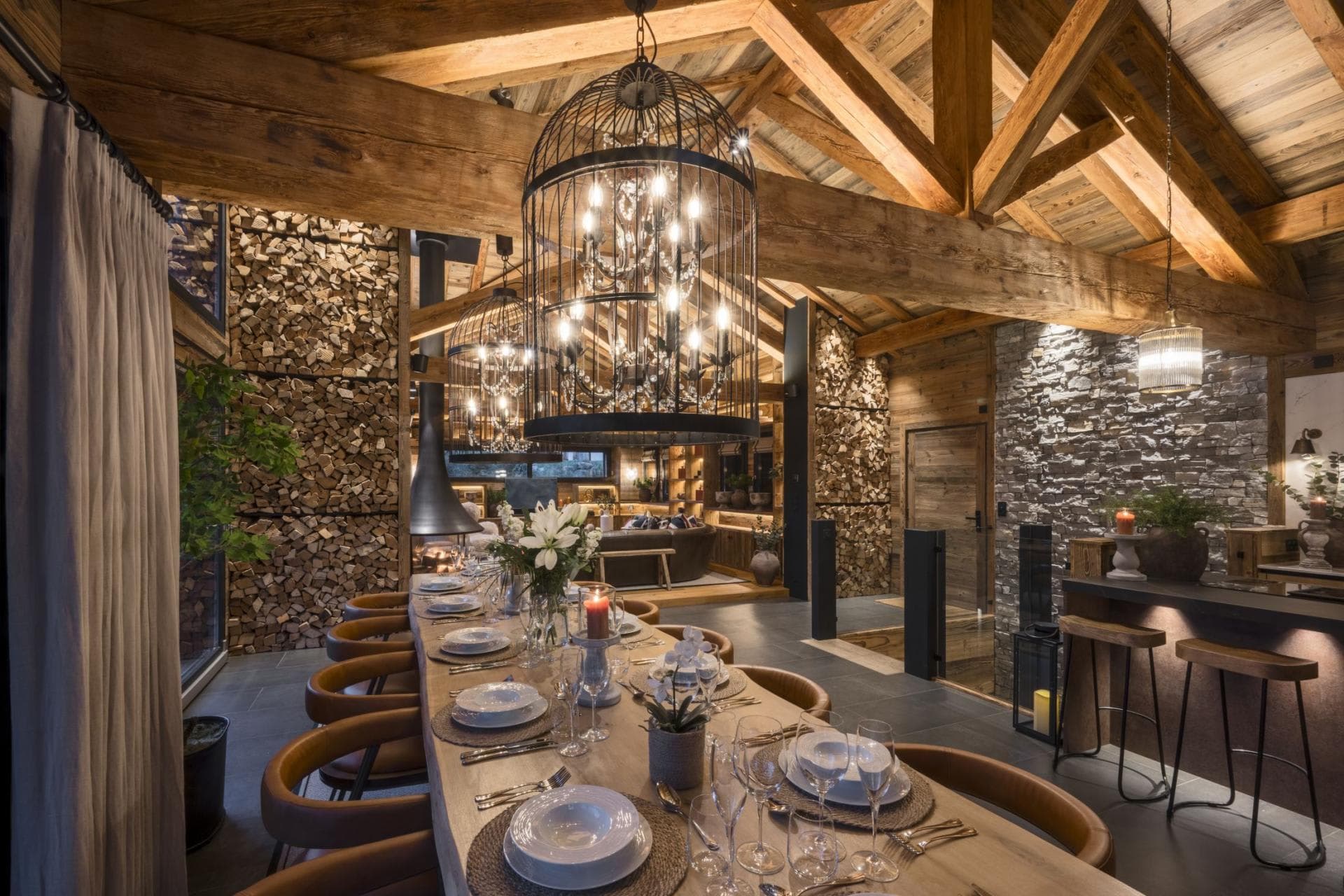Dining area with seating for 12; stone accents and wood-burning fireplace