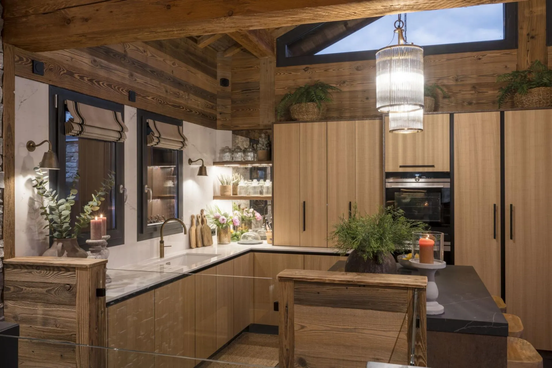 Open-plan kitchen with island and breakfast-bar seating