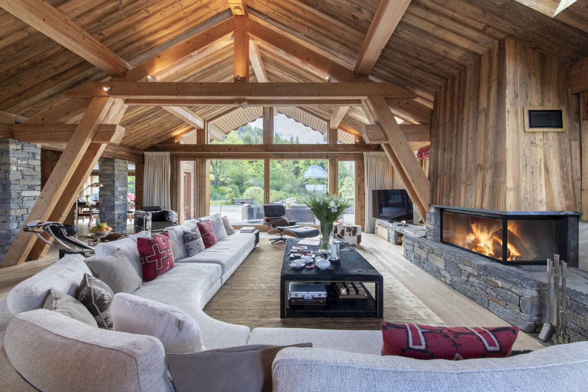 Living area with wood-burning fireplace and sectional seating for 10