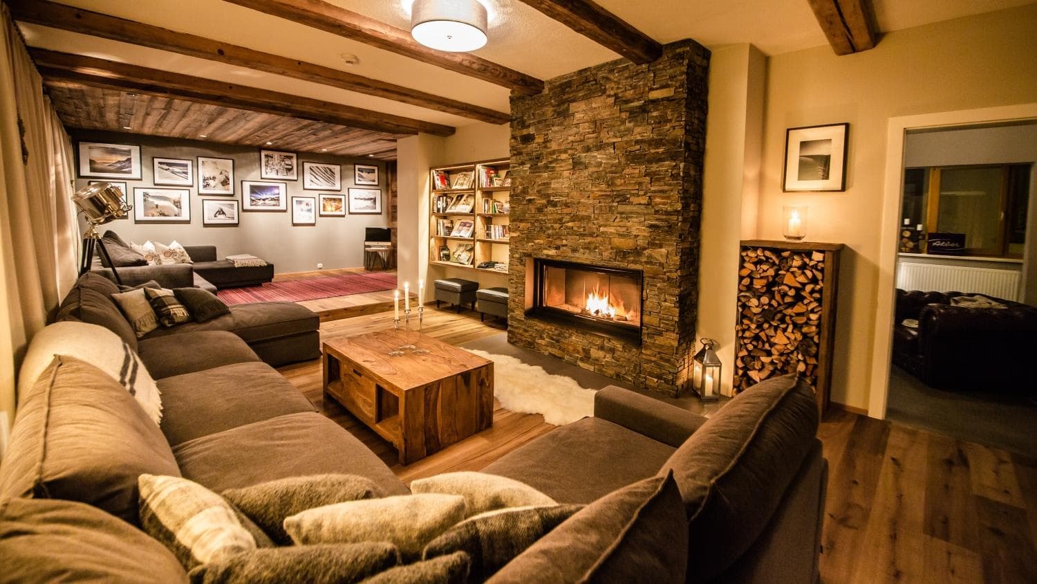 Living area with wood-burning fireplace and sectional seating for 10