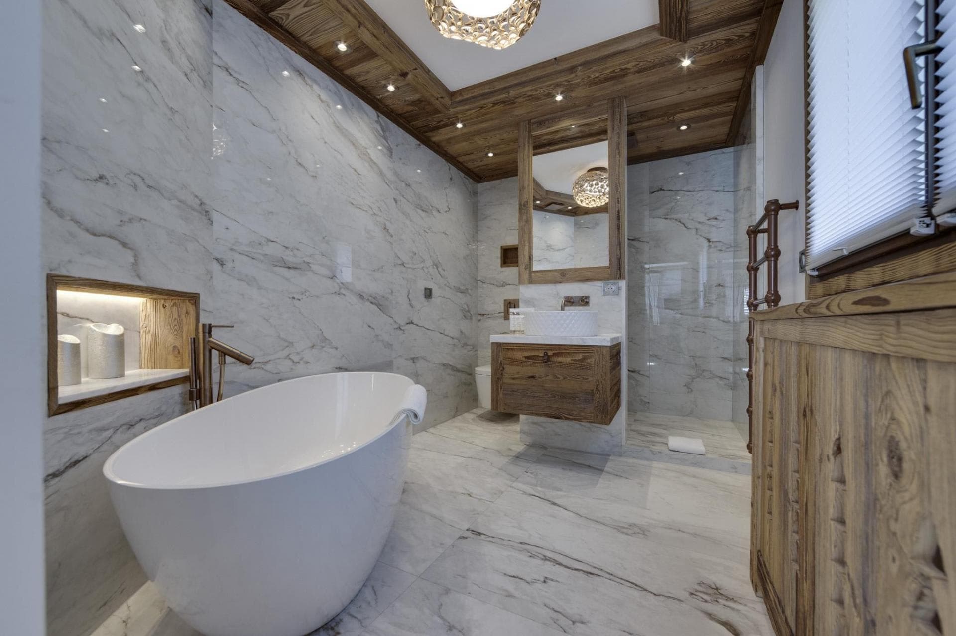 Bathroom with freestanding soaking tub and walk-in rain shower