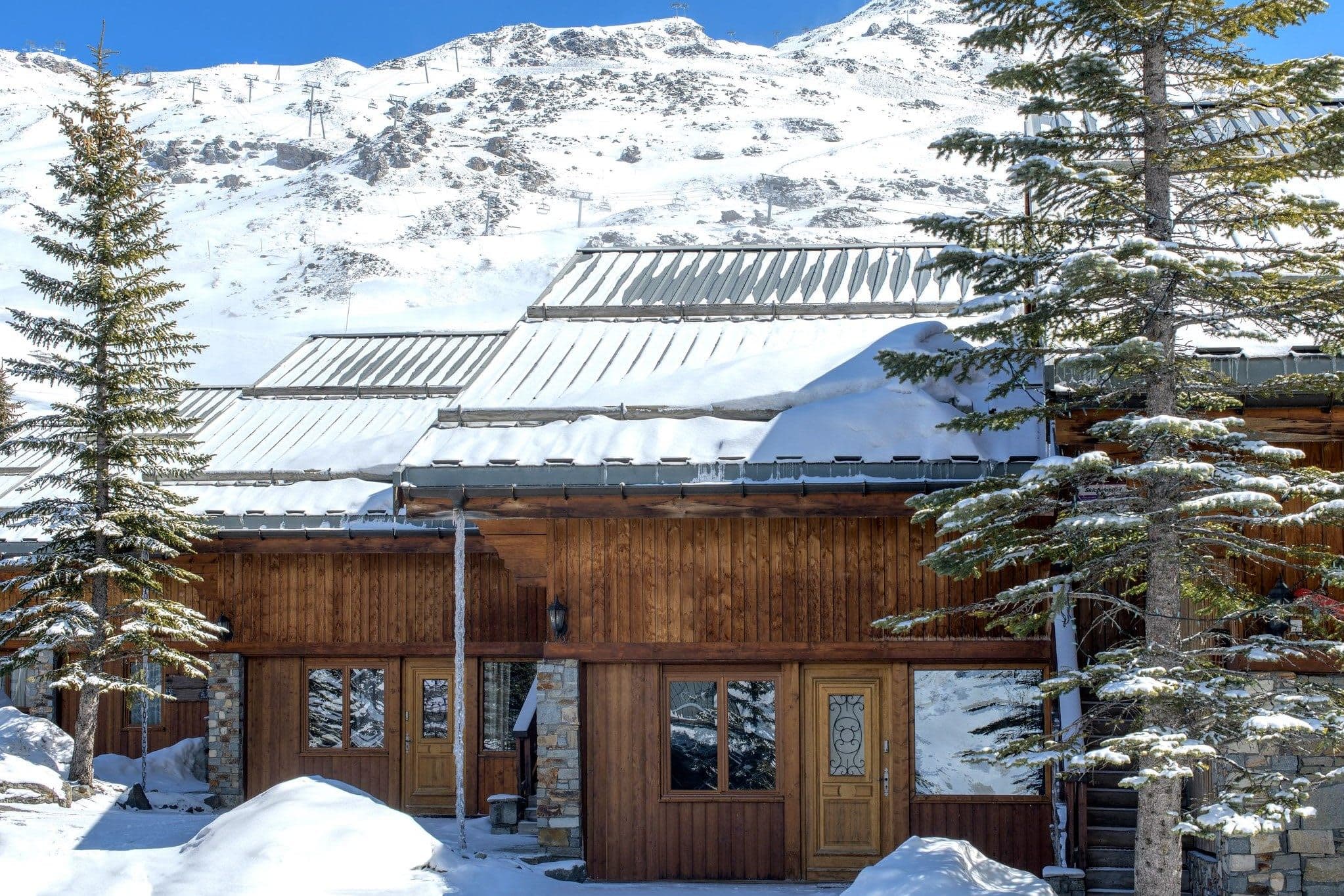 Ski-in, ski-out timber chalet with direct access to mountain slopes