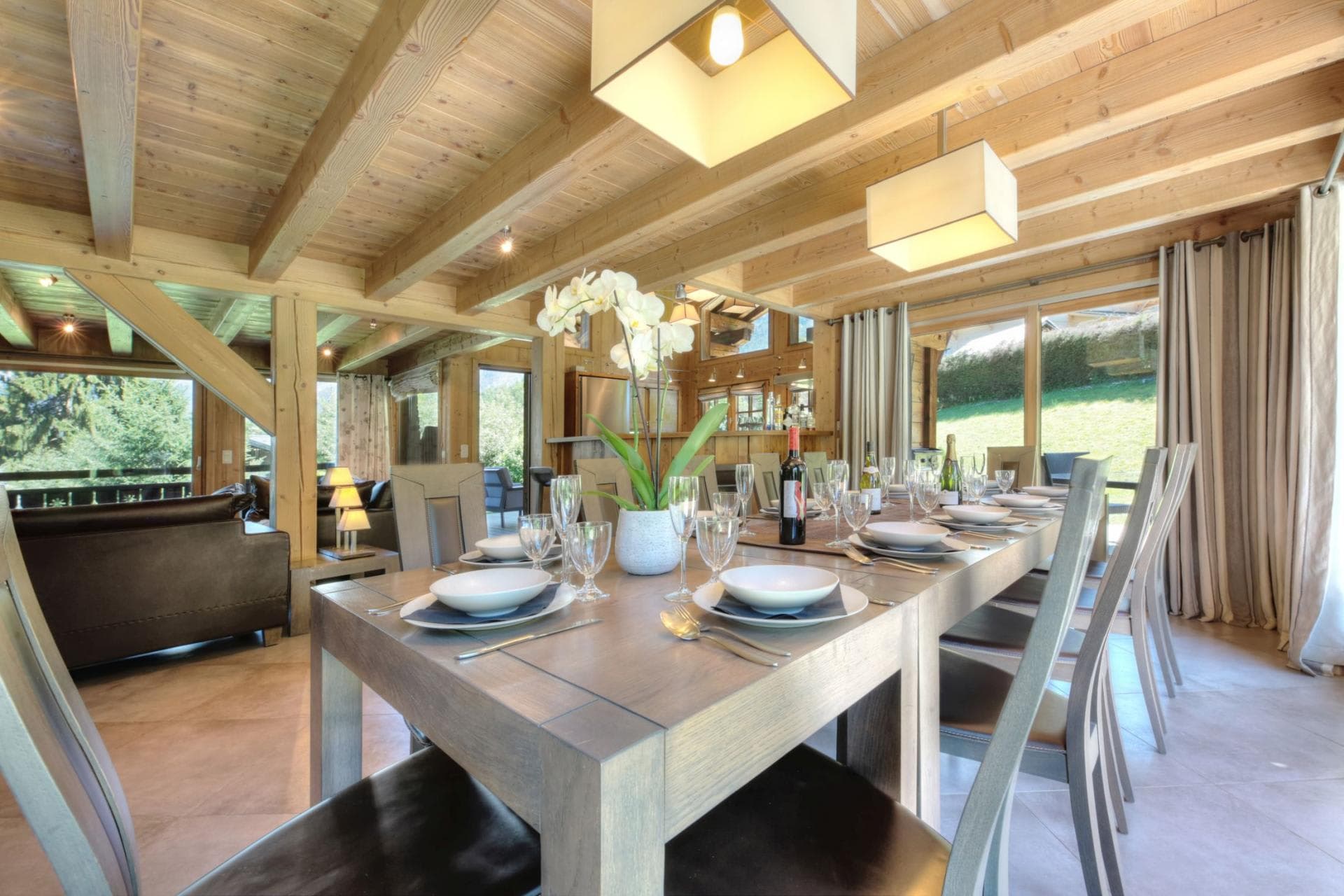 Dining area with seating for 10 and beamed ceilings